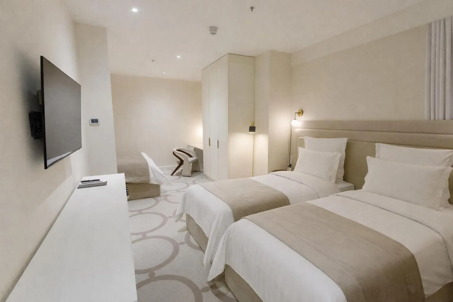 Bed in Ambassadori Tbilisi Hotel