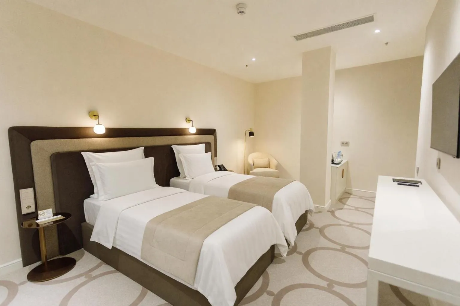 Bed in Ambassadori Tbilisi Hotel