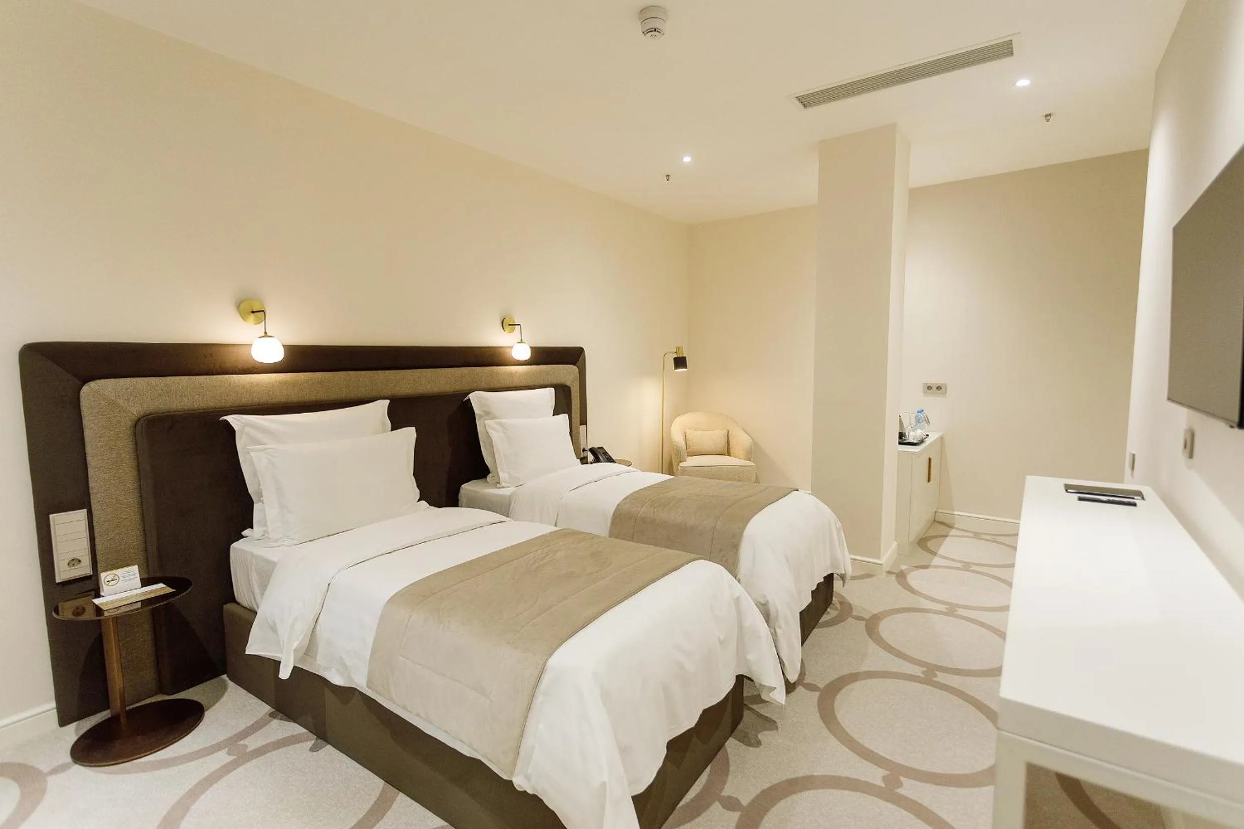 Bed in Ambassadori Tbilisi Hotel