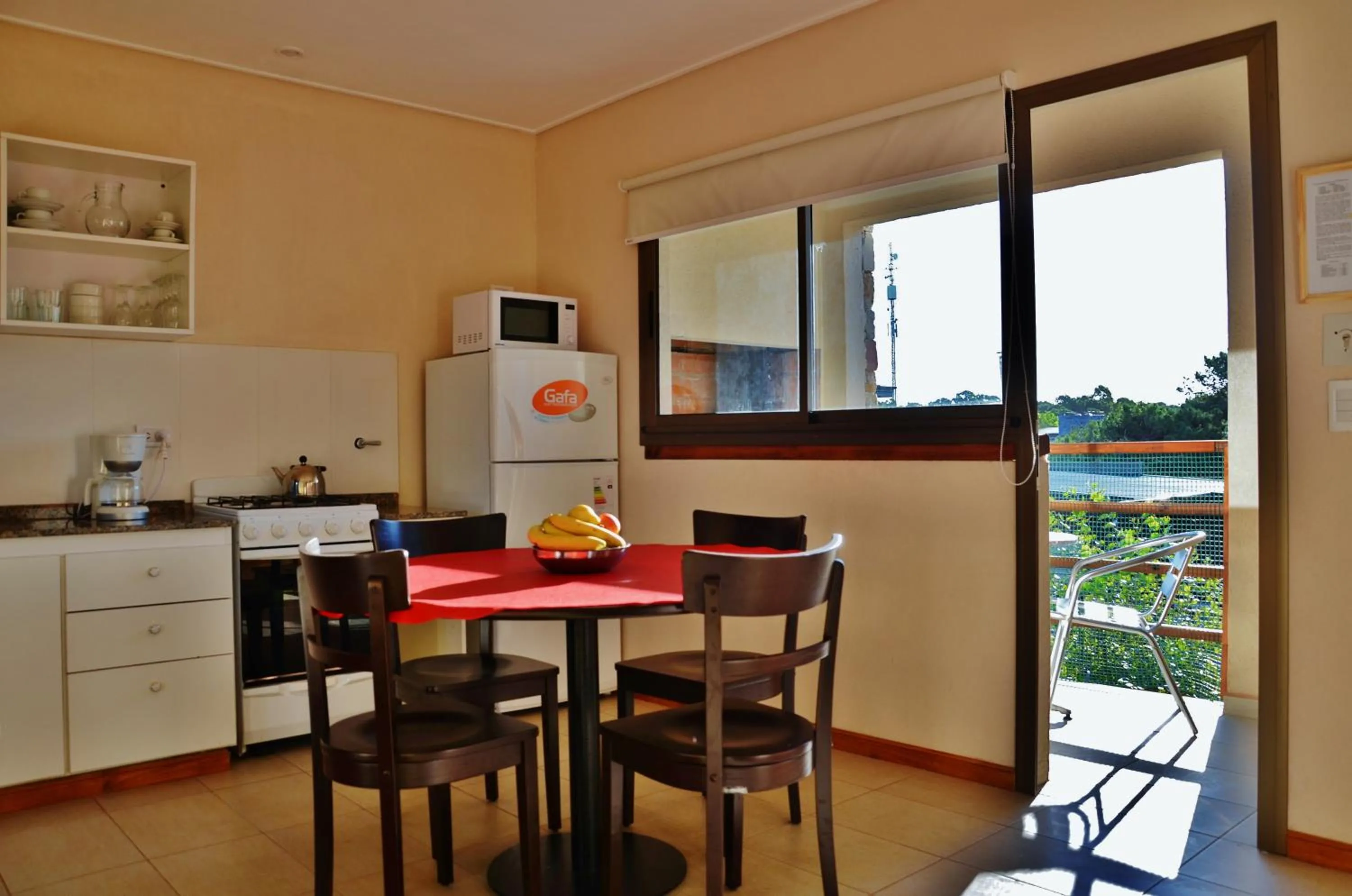 Kitchen or kitchenette in Viñas del Mar Apart & SPA Aparthotel