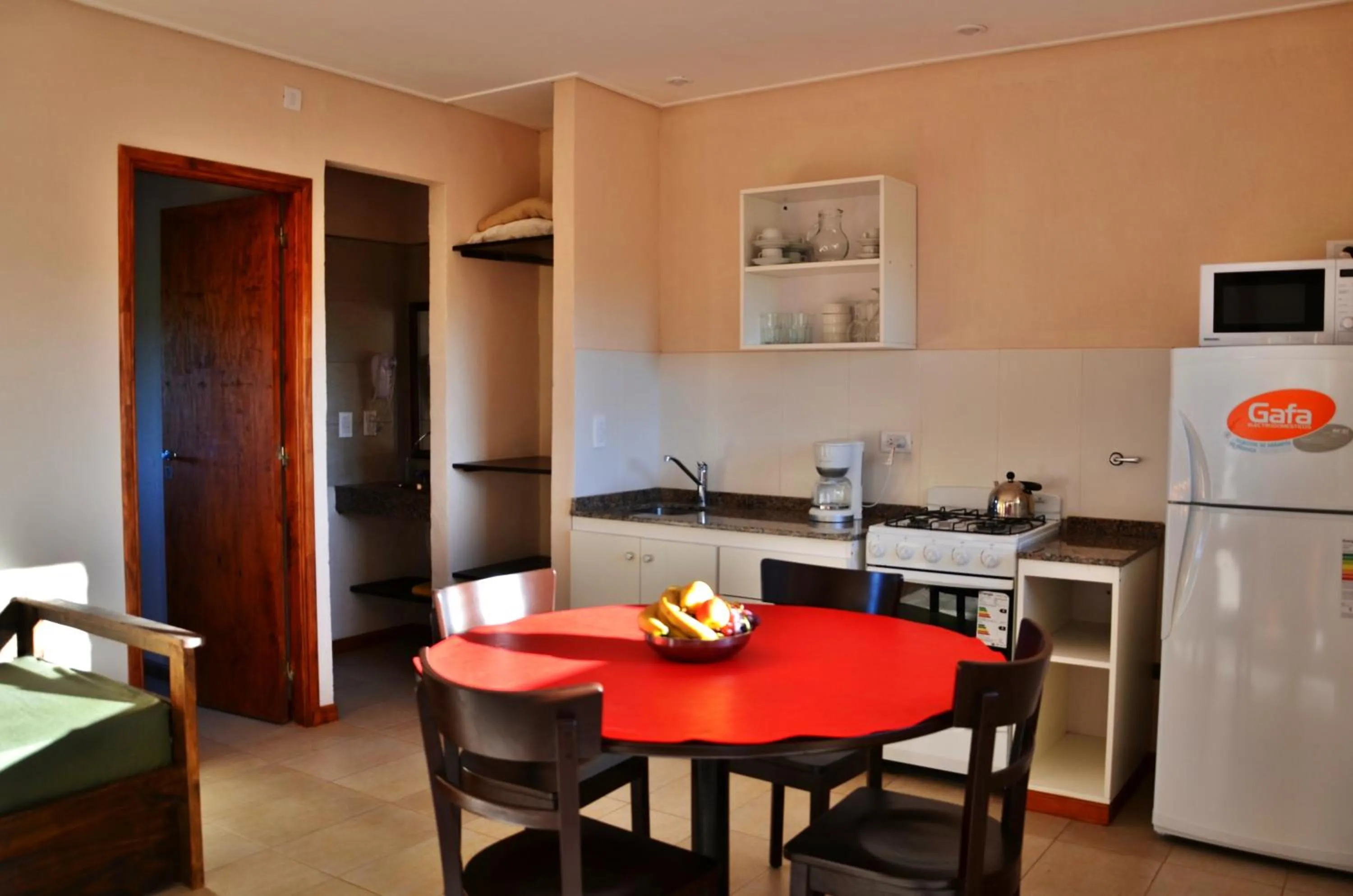 Kitchen or kitchenette in Viñas del Mar Apart & SPA Aparthotel