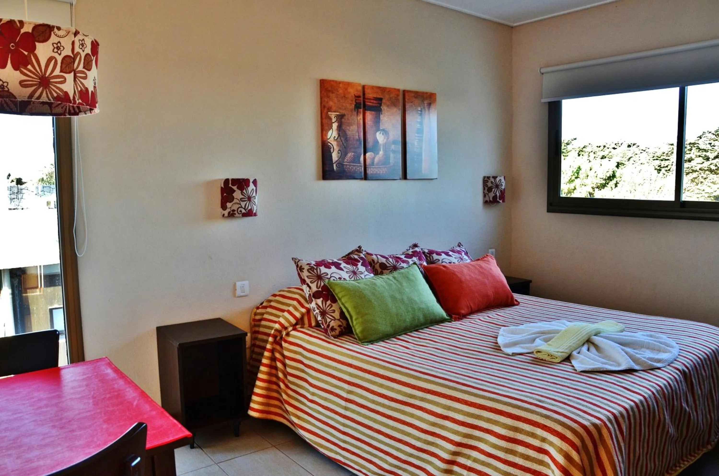 Bedroom, Bed in Viñas del Mar Apart & SPA Aparthotel