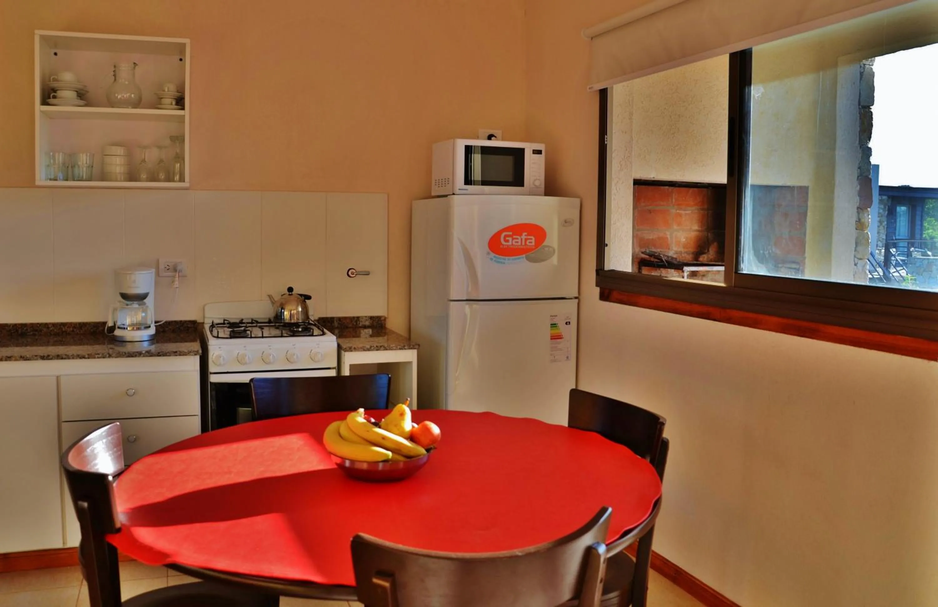 Kitchen or kitchenette in Viñas del Mar Apart & SPA Aparthotel