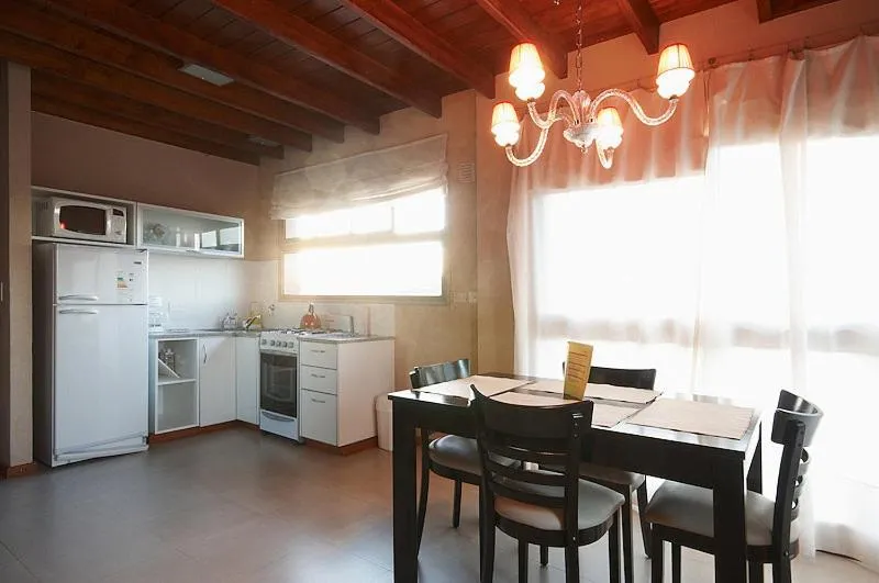 Kitchen or kitchenette in Viñas del Mar Apart & SPA Aparthotel