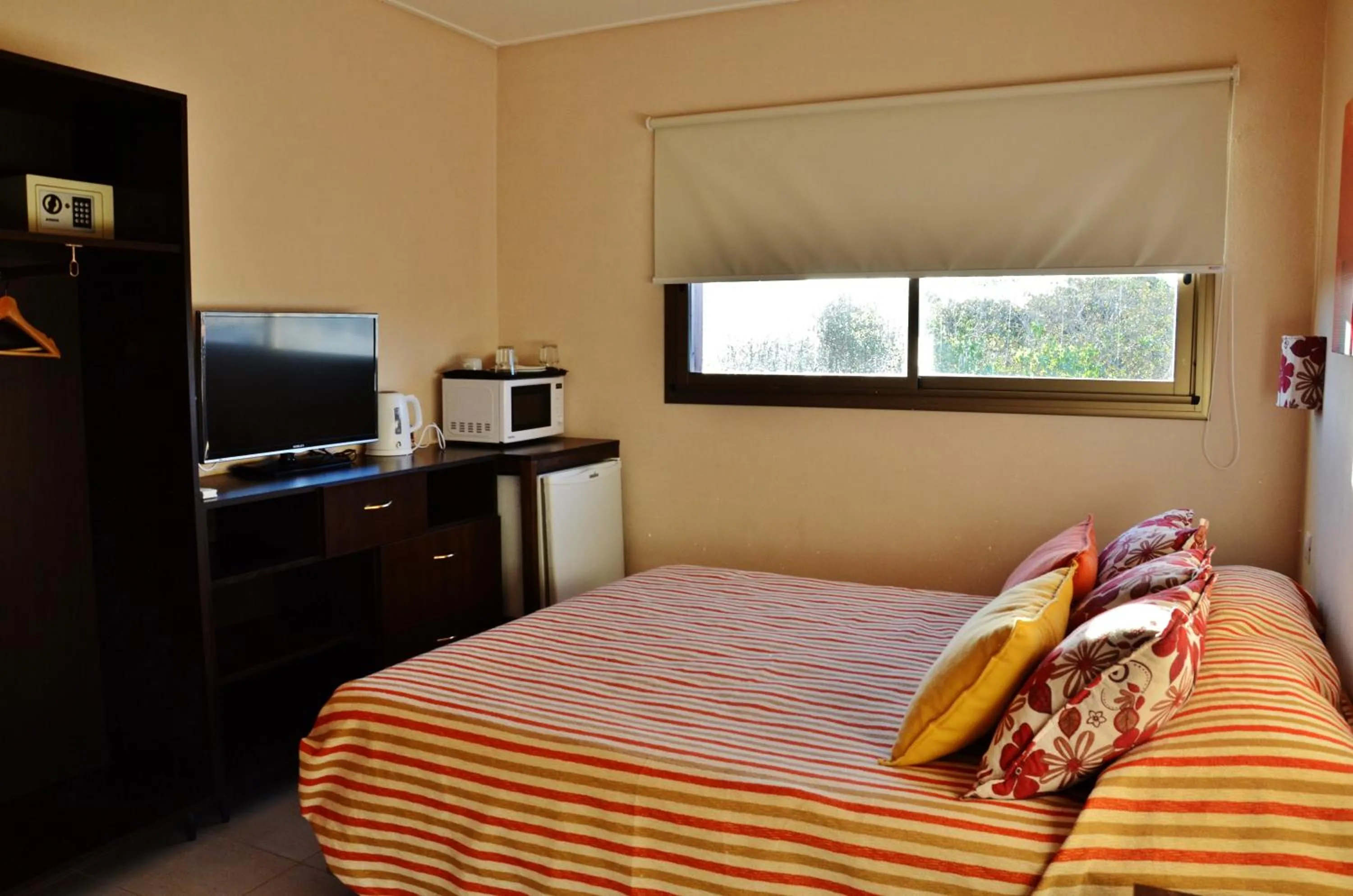 Bedroom, Bed in Viñas del Mar Apart & SPA Aparthotel