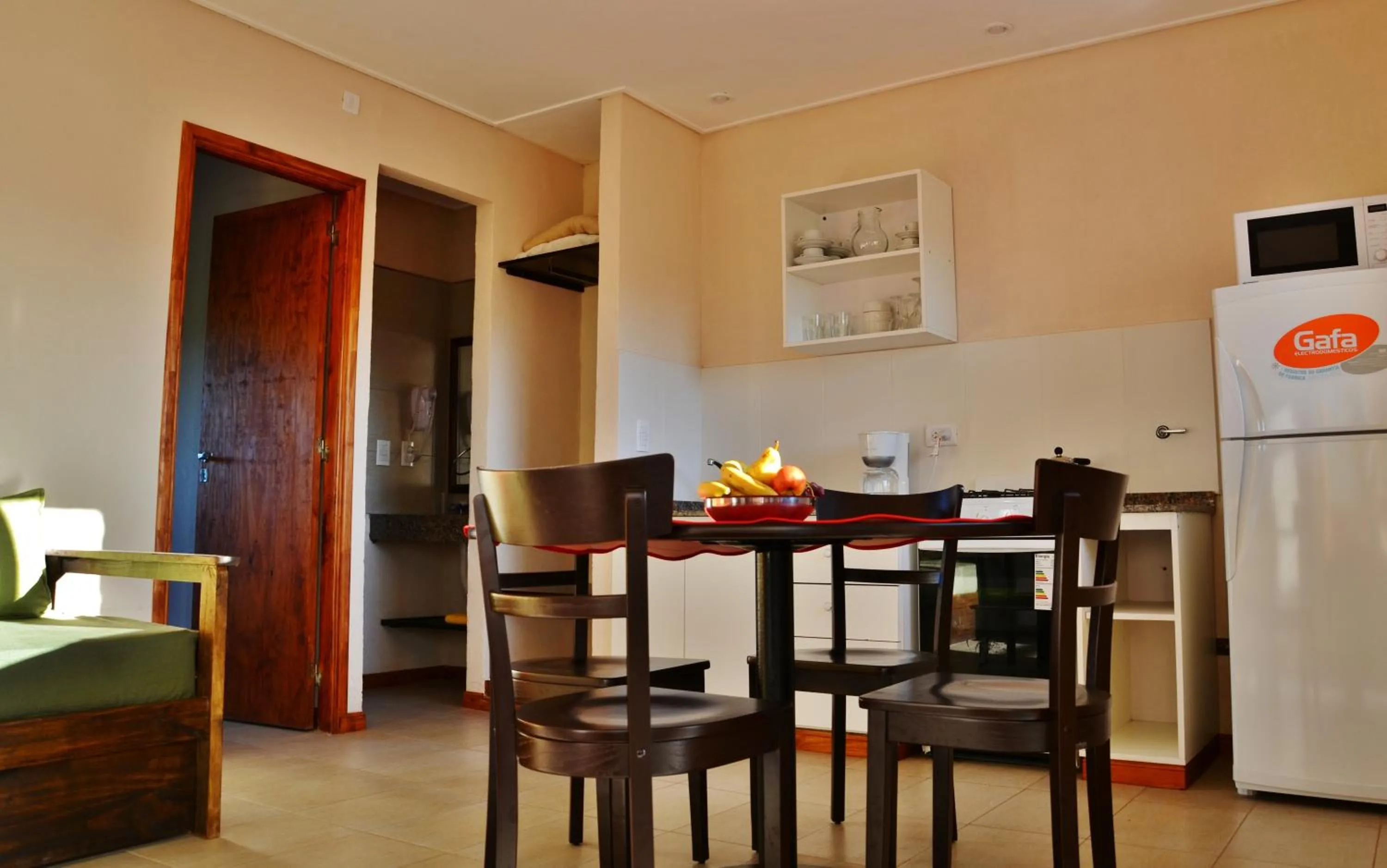 Kitchen or kitchenette in Viñas del Mar Apart & SPA Aparthotel