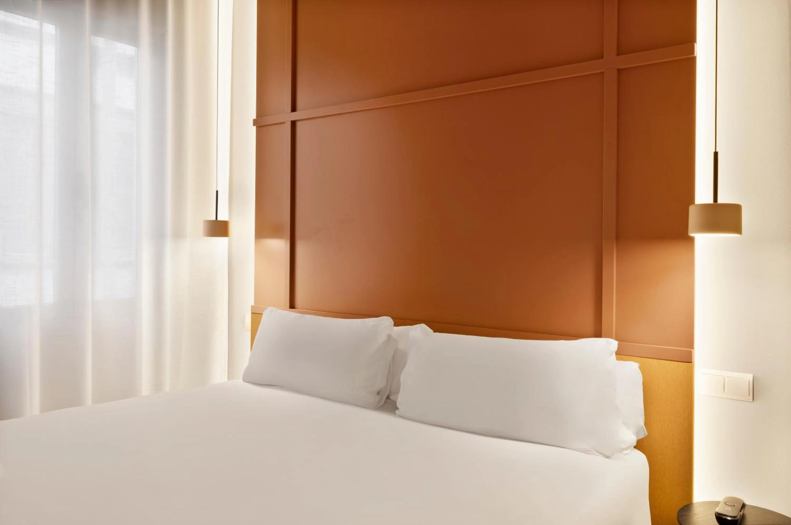 Bed in B&B HOTEL Apartamentos Madrid Centro Fuencarral 46