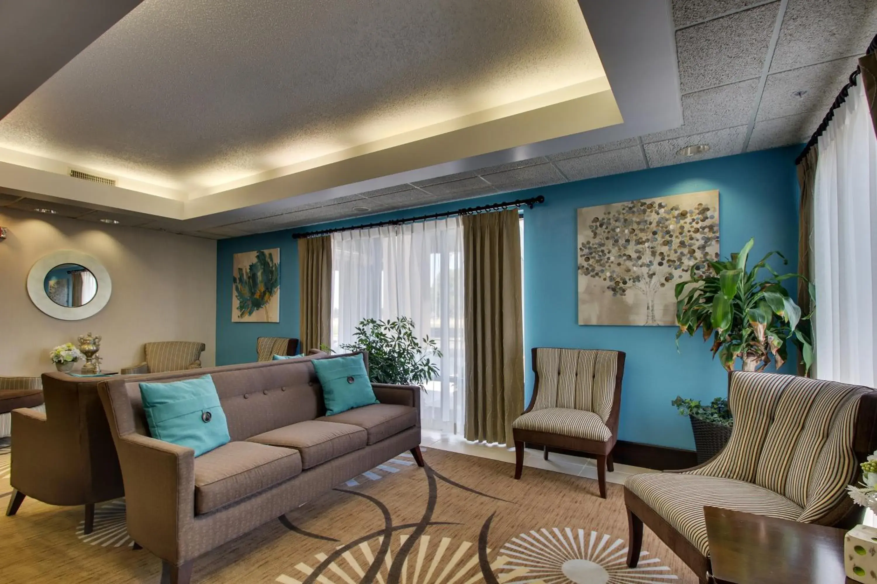 Breakfast, Seating Area in Wingfield Inn & Suites