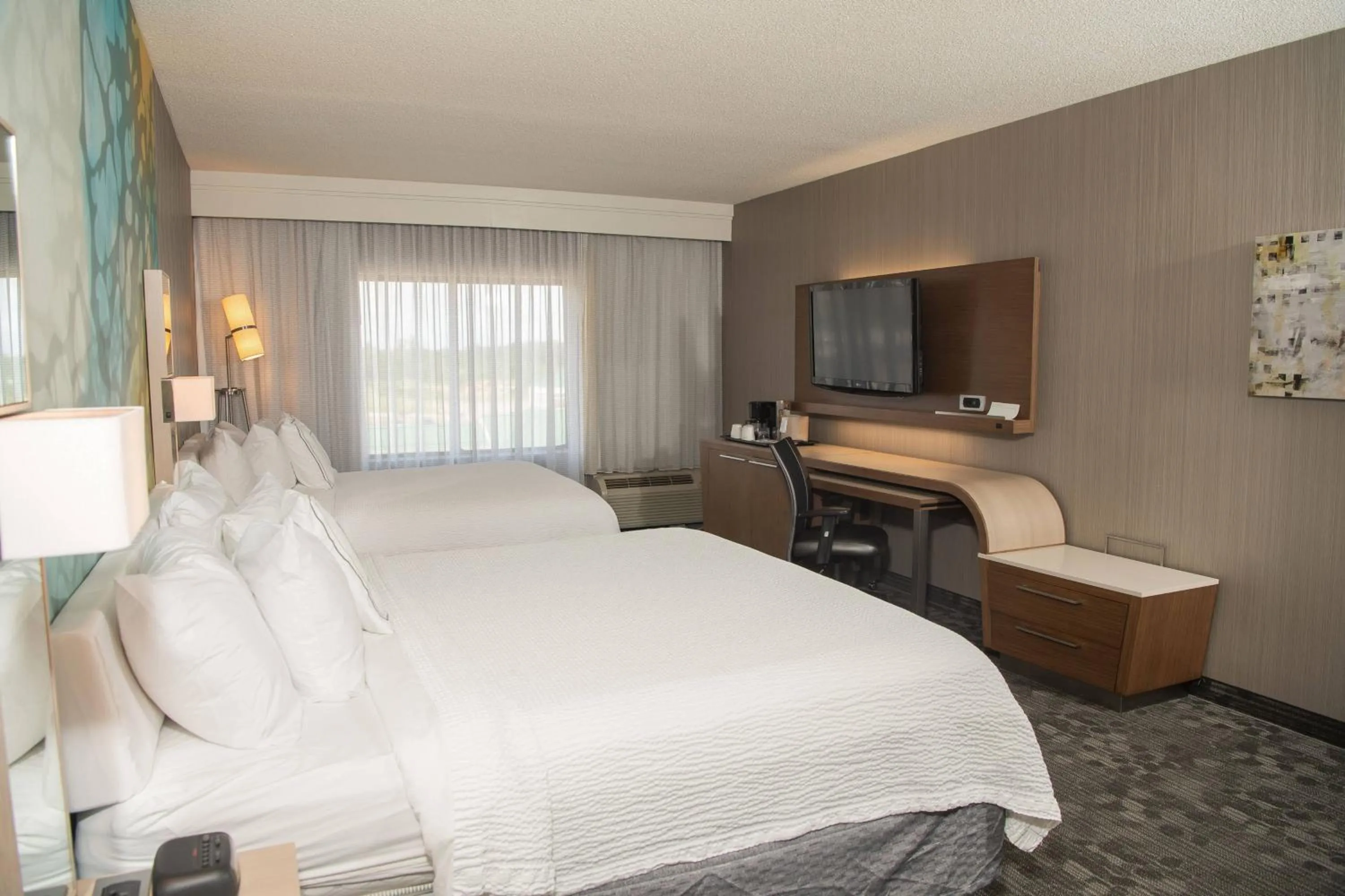 Photo of the whole room, Bed in Courtyard by Marriott Erie Ambassador Conference Center