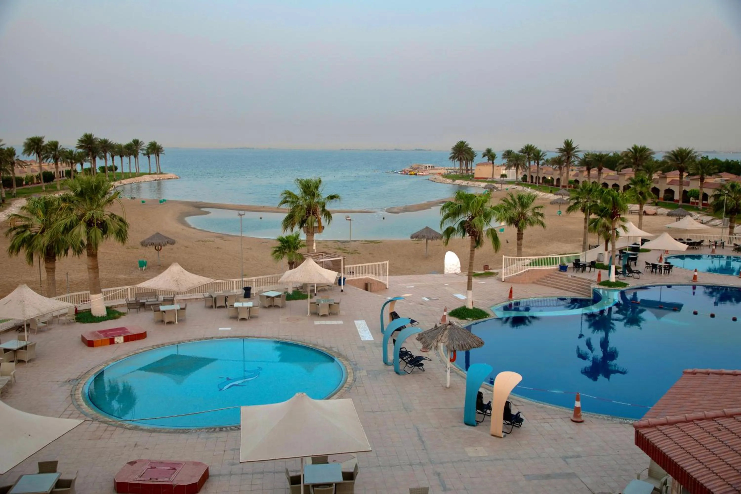 Property building in Mena Holiday Beach Resort Half Moon