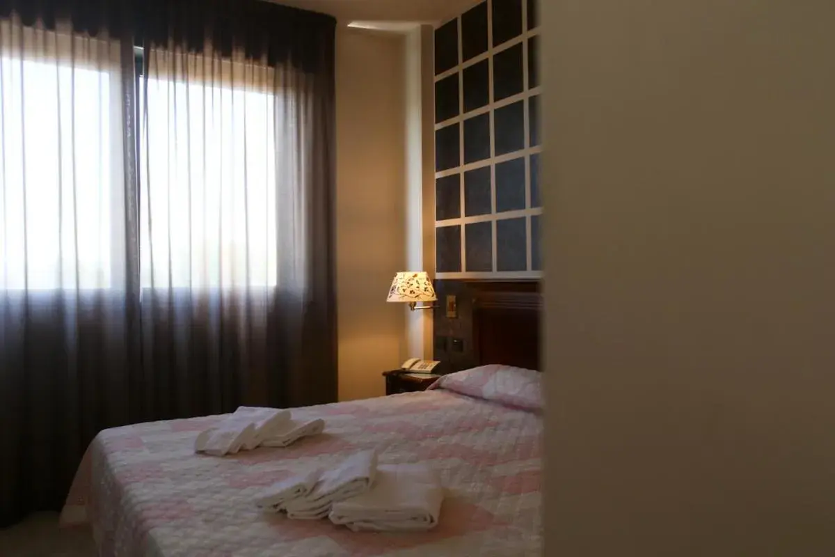 Bedroom, Bed in Hotel Fidenza Bedroom, Bed in Hotel Fidenza