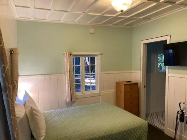 Bed in Emerald Forest Cabins