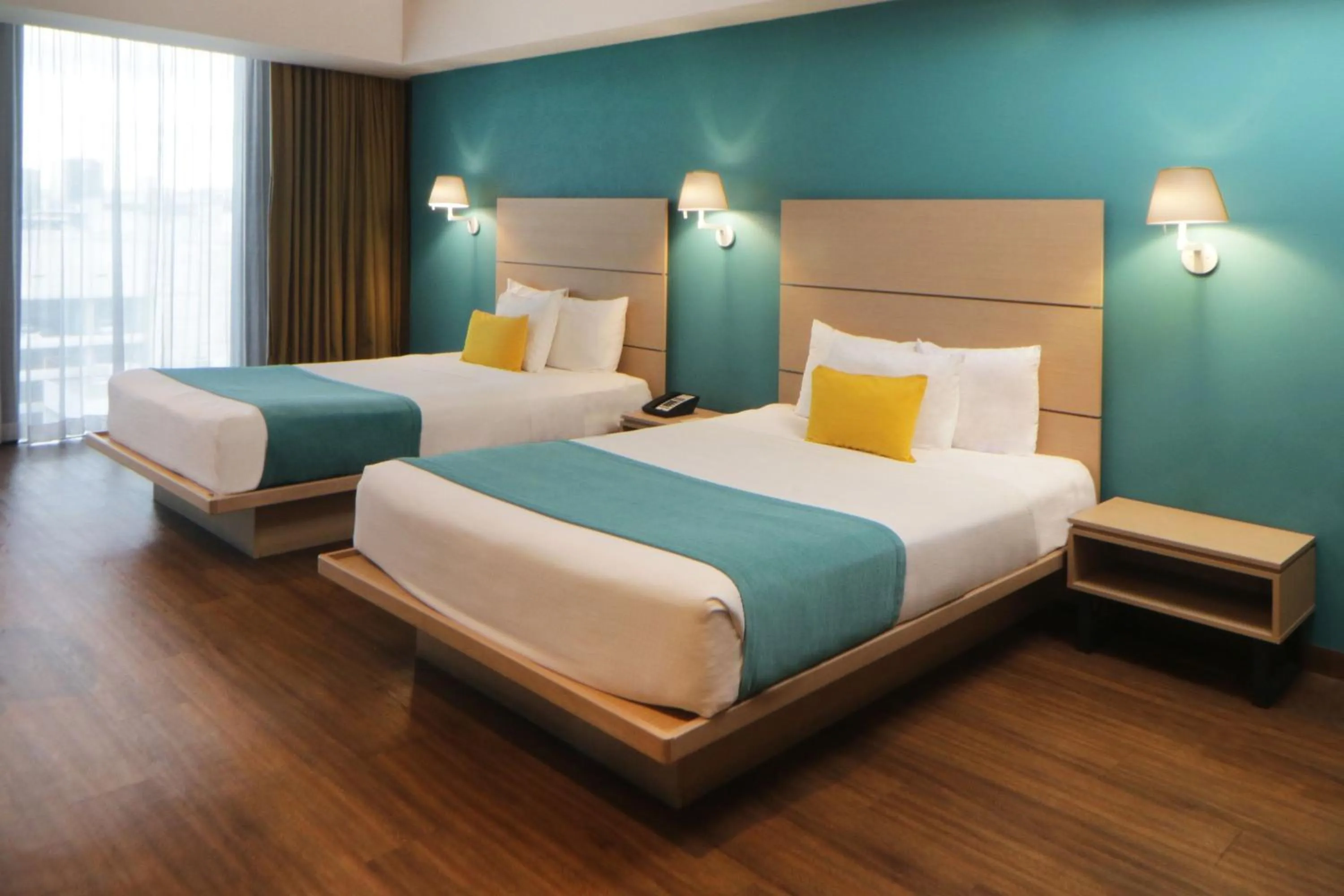 Bedroom, Bed in City Express Suites by Marriott Tijuana Rio