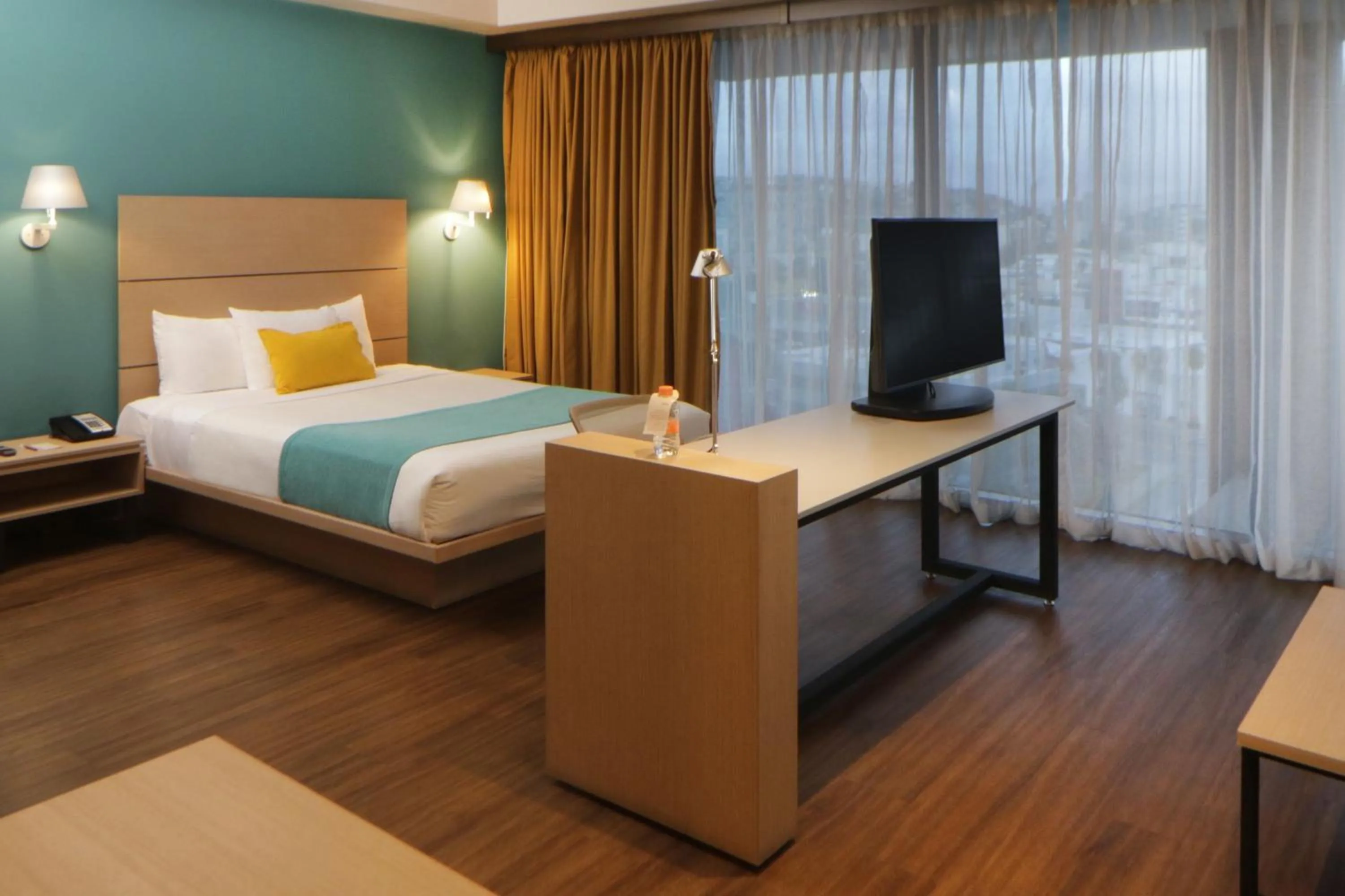 Bedroom, Bed in City Express Suites by Marriott Tijuana Rio