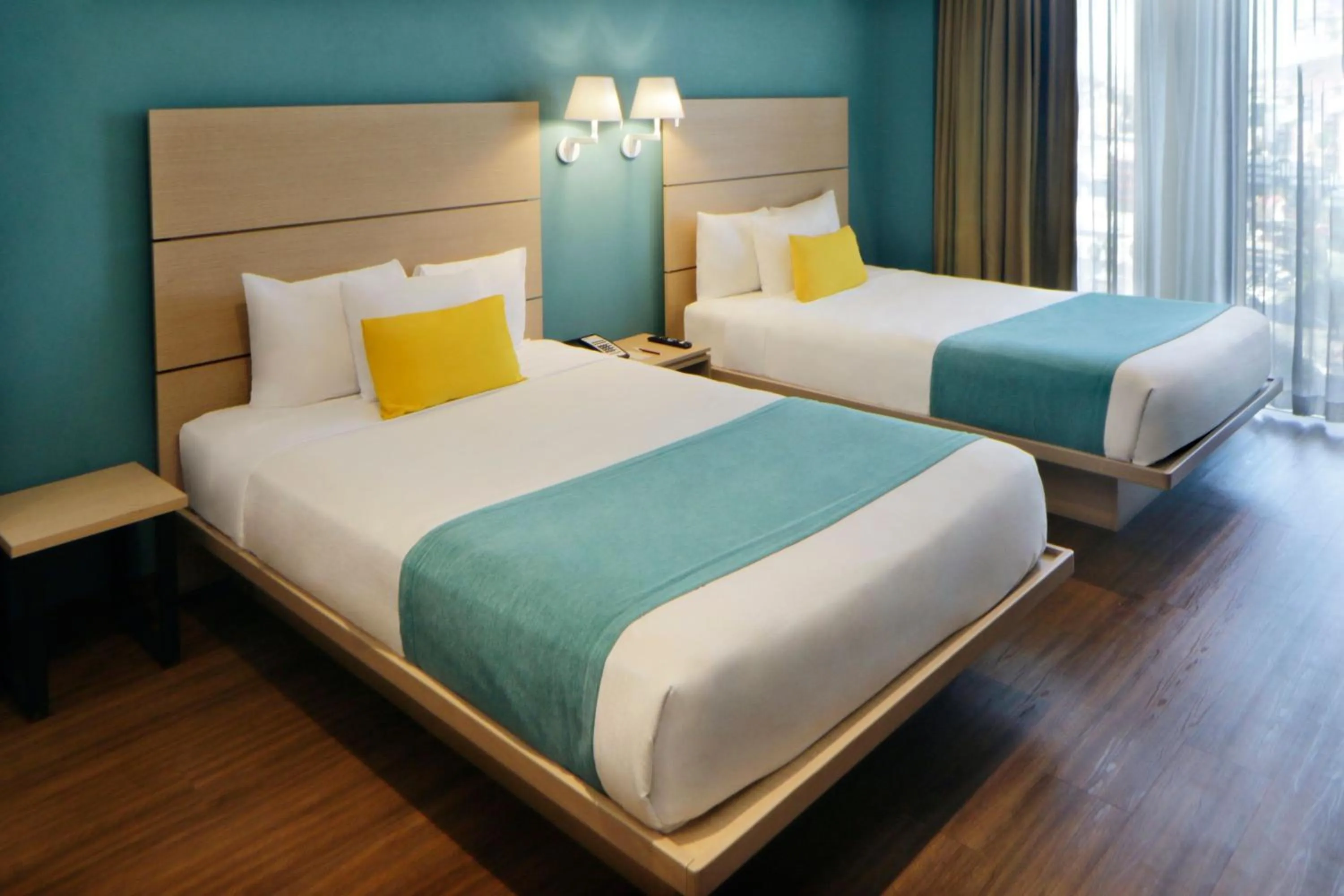 Photo of the whole room, Bed in City Express Suites by Marriott Tijuana Rio