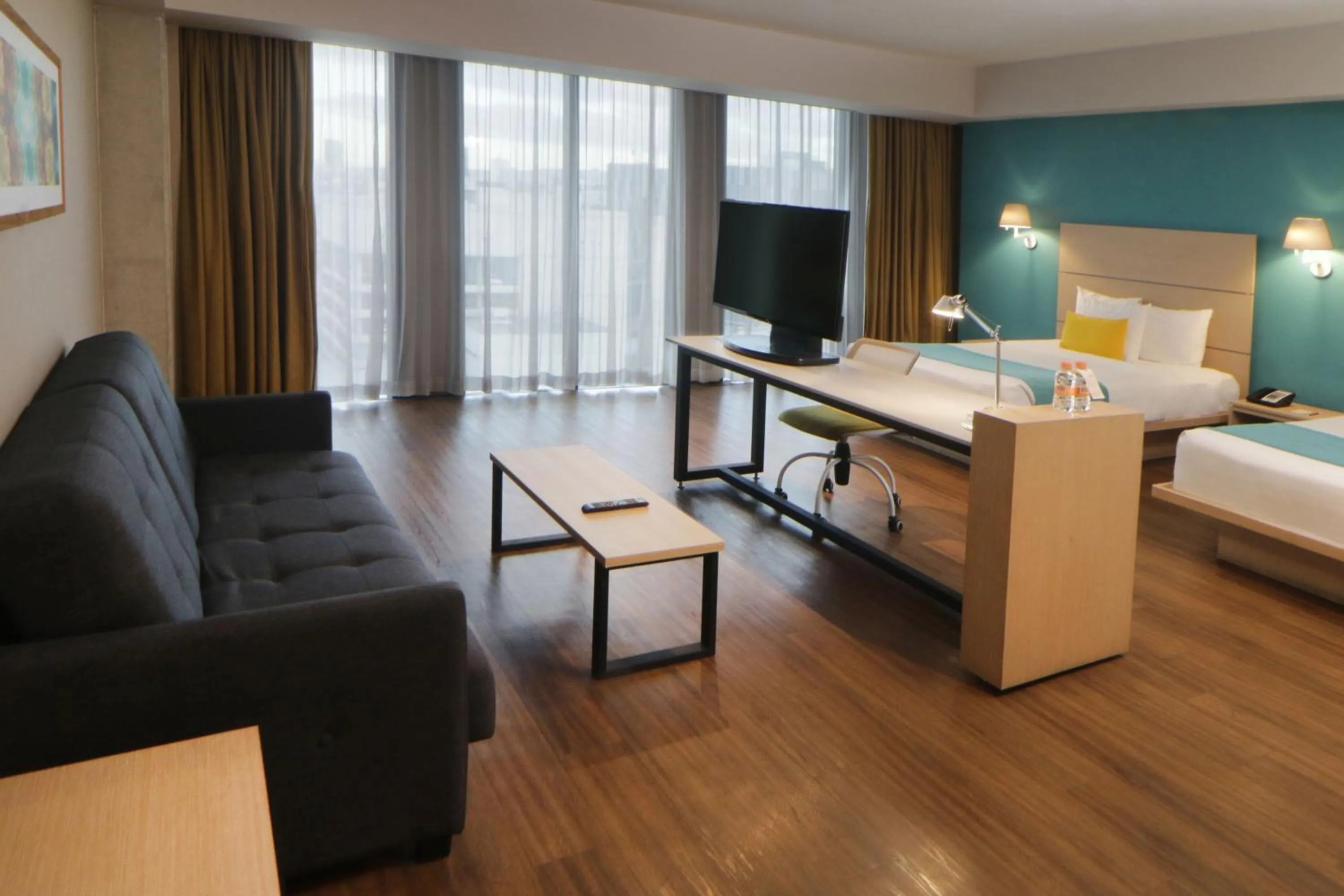 Bedroom, Bed in City Express Suites by Marriott Tijuana Rio