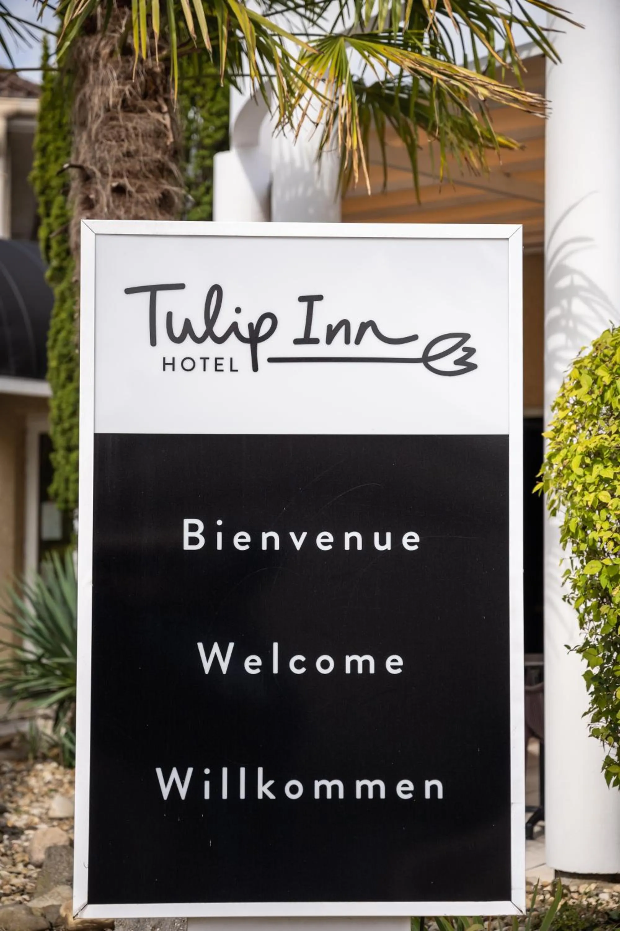 Property logo or sign in Tulip Inn Beaune