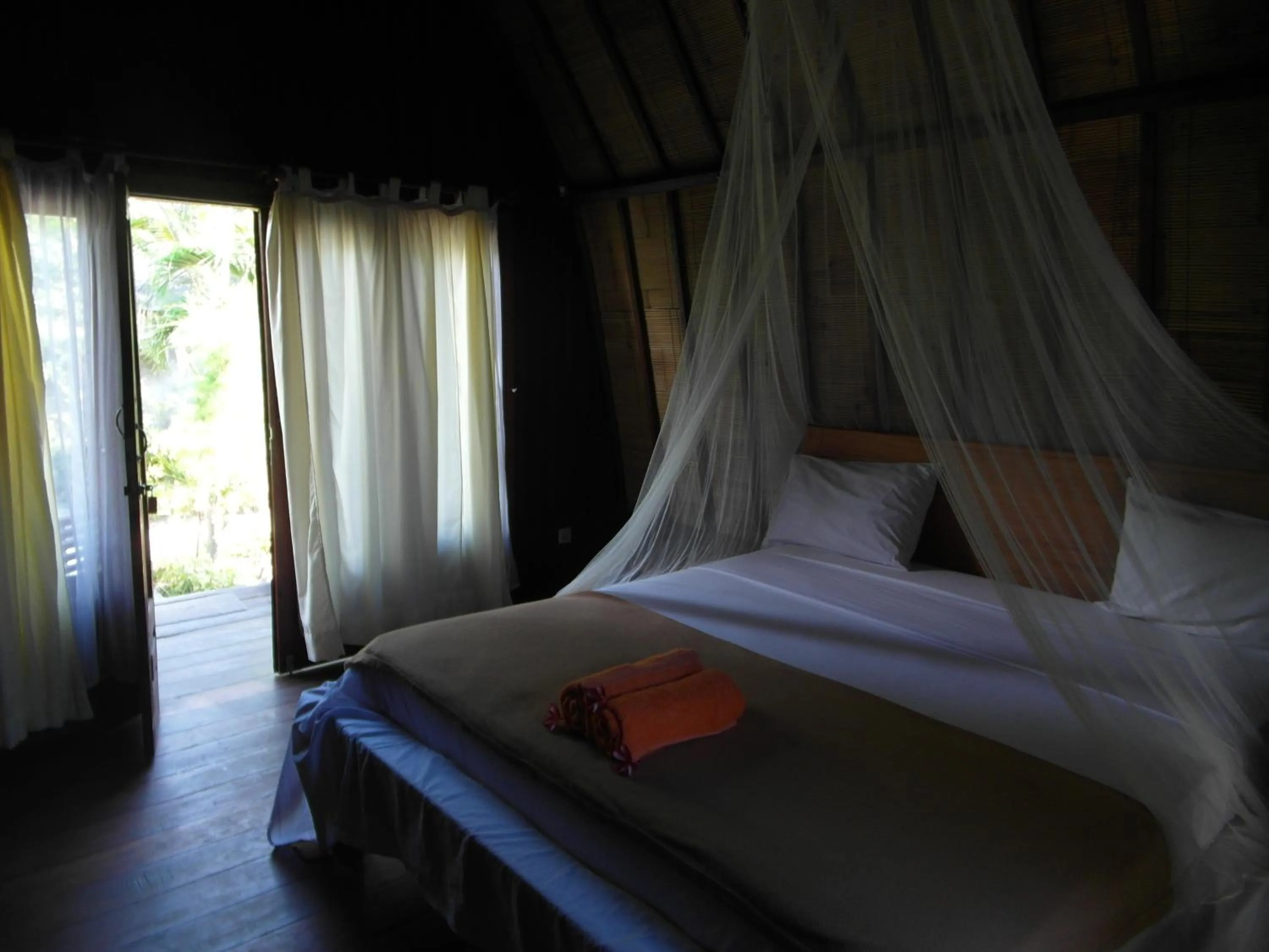 Bed in Melati Cottage