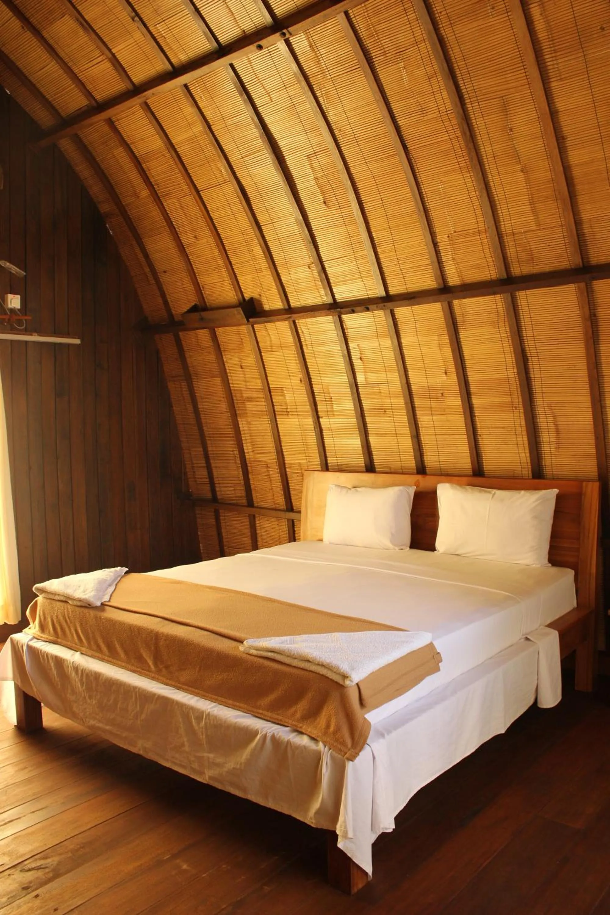 Photo of the whole room, Bed in Melati Cottage