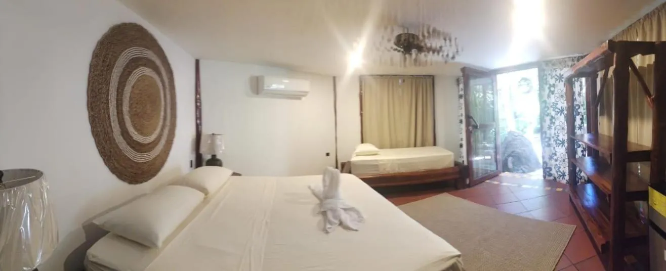 Photo of the whole room, Bed in Locanda Samara Beach