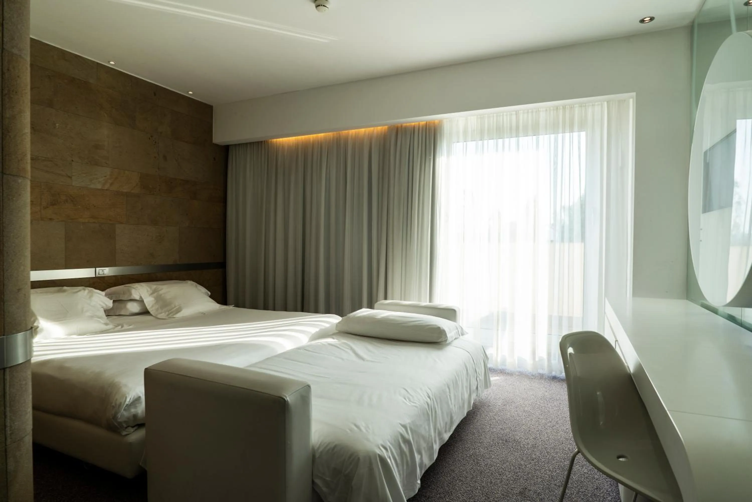 Bed in A Point Arezzo Park Hotel