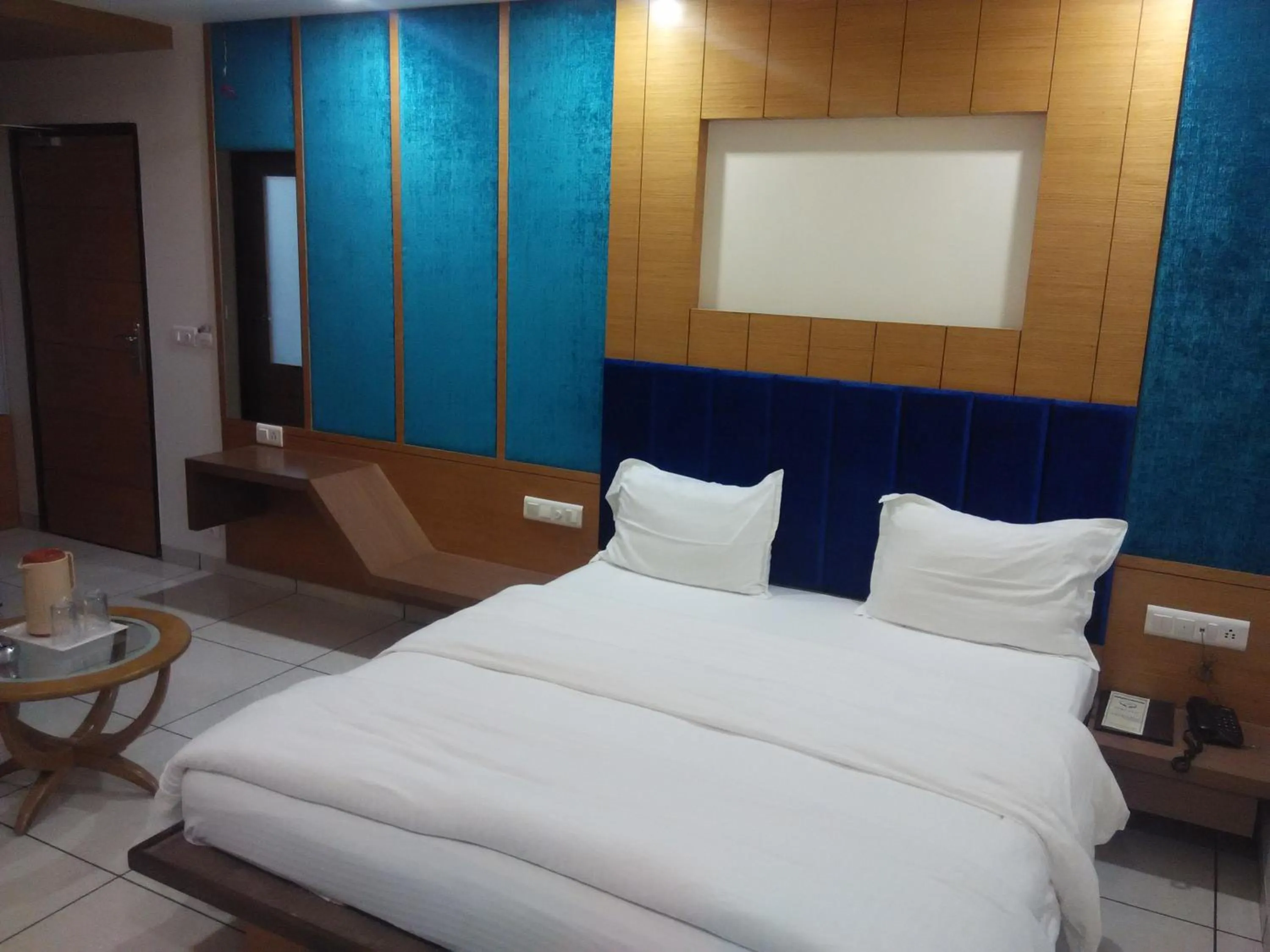 Bed in Hotel Apex Inn