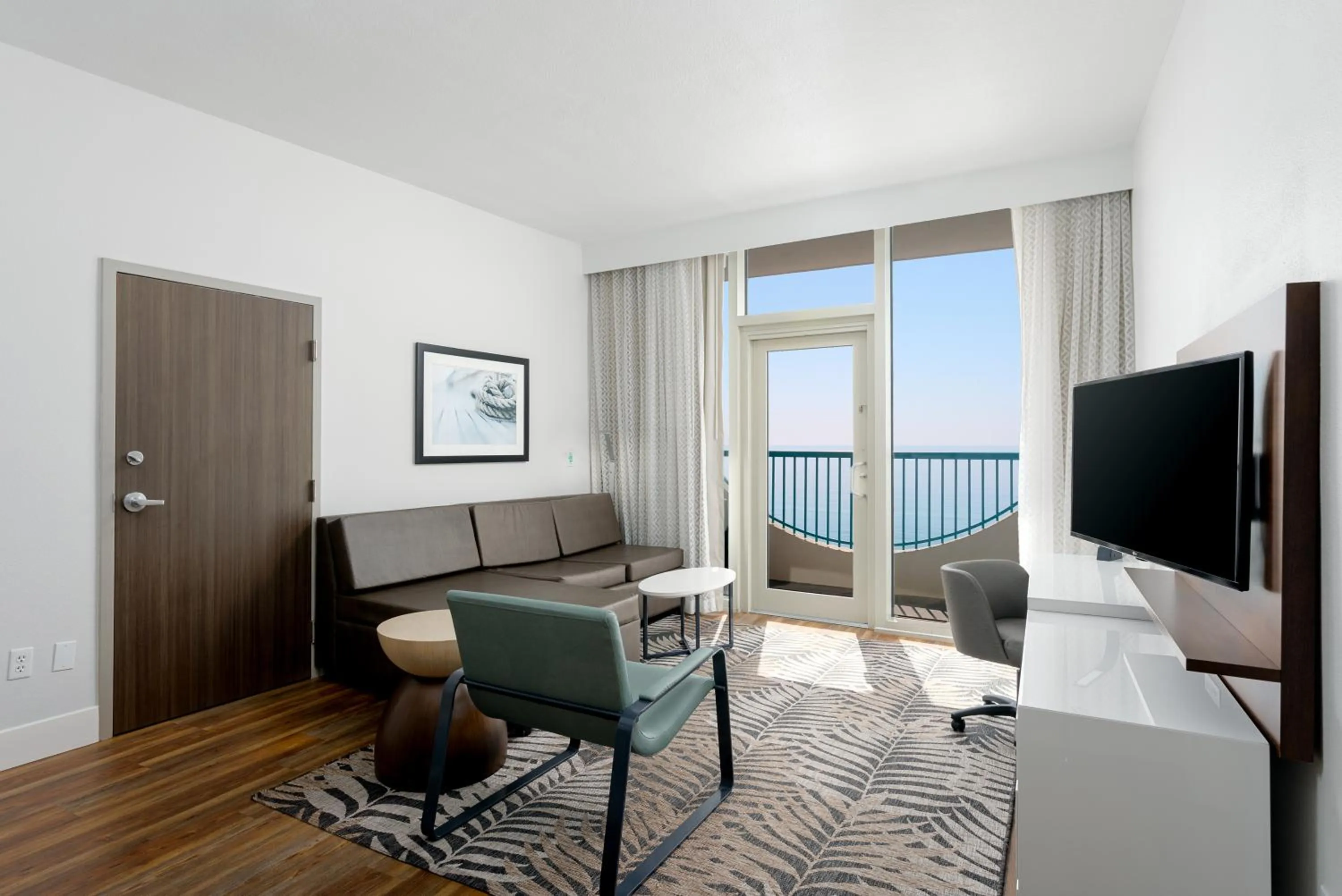 Living room in Holiday Inn Express Pensacola Beach by IHG