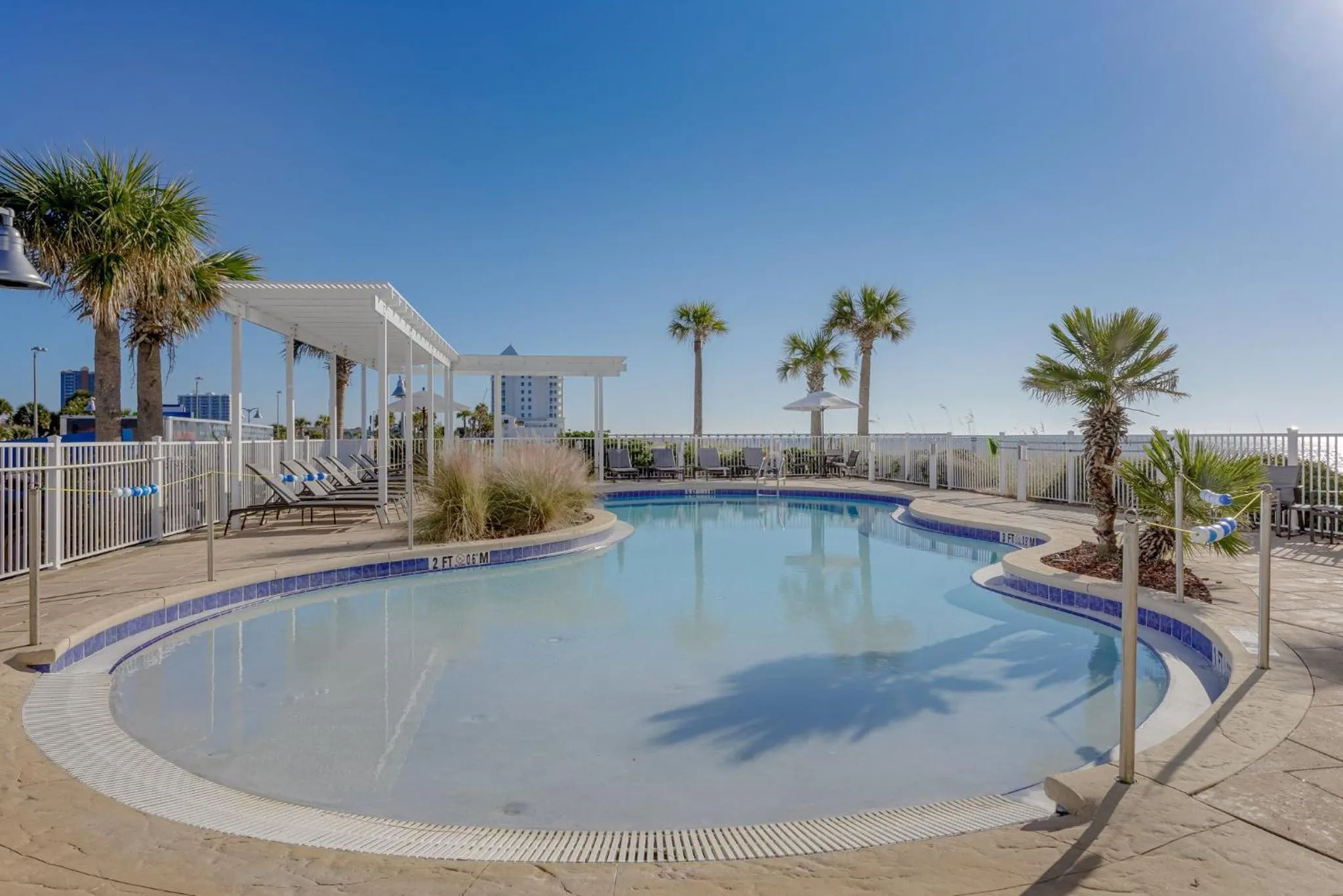 Swimming pool in Holiday Inn Express Pensacola Beach by IHG