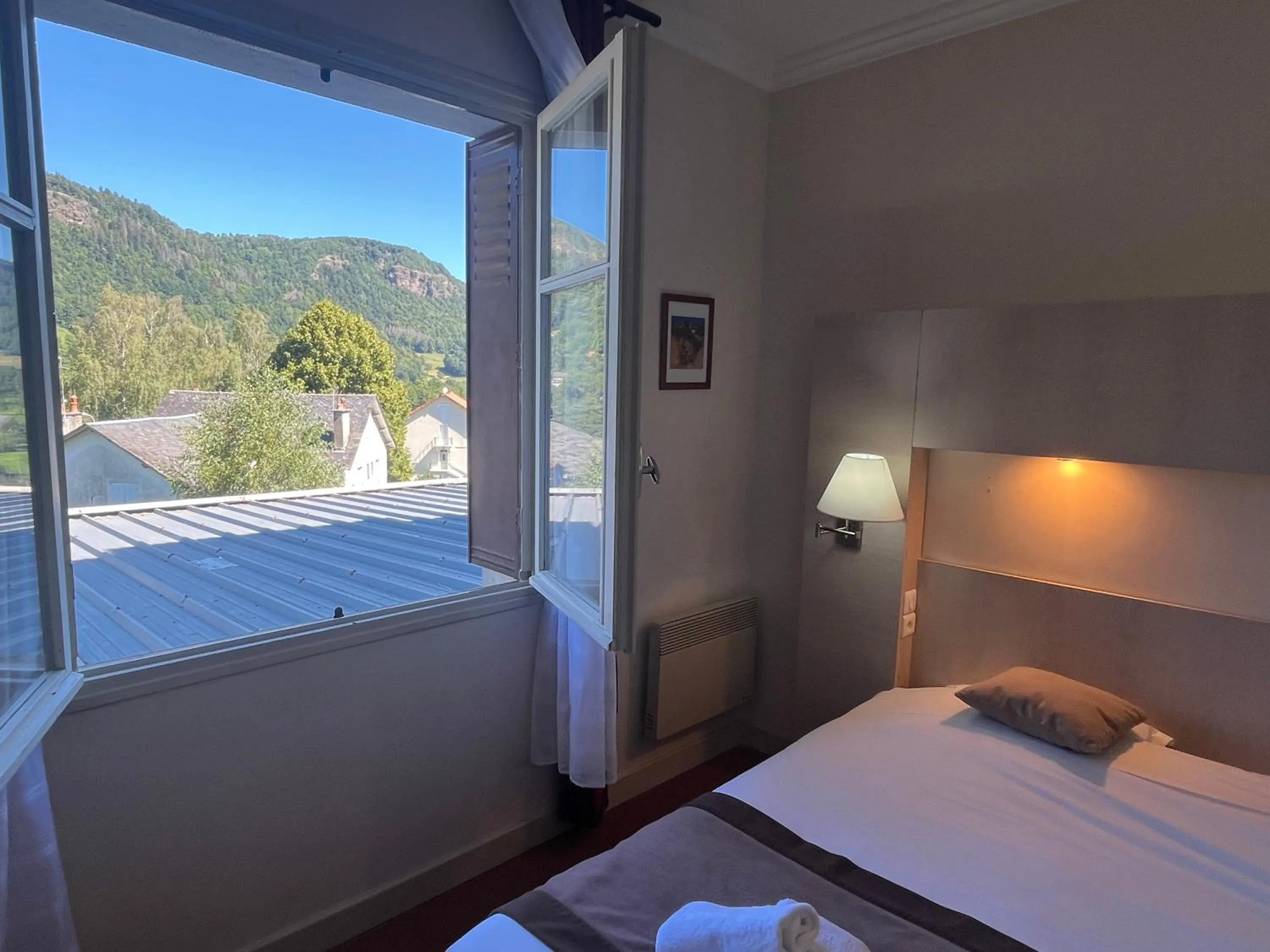 Bed in Logis Hôtel restaurant Bel Horizon