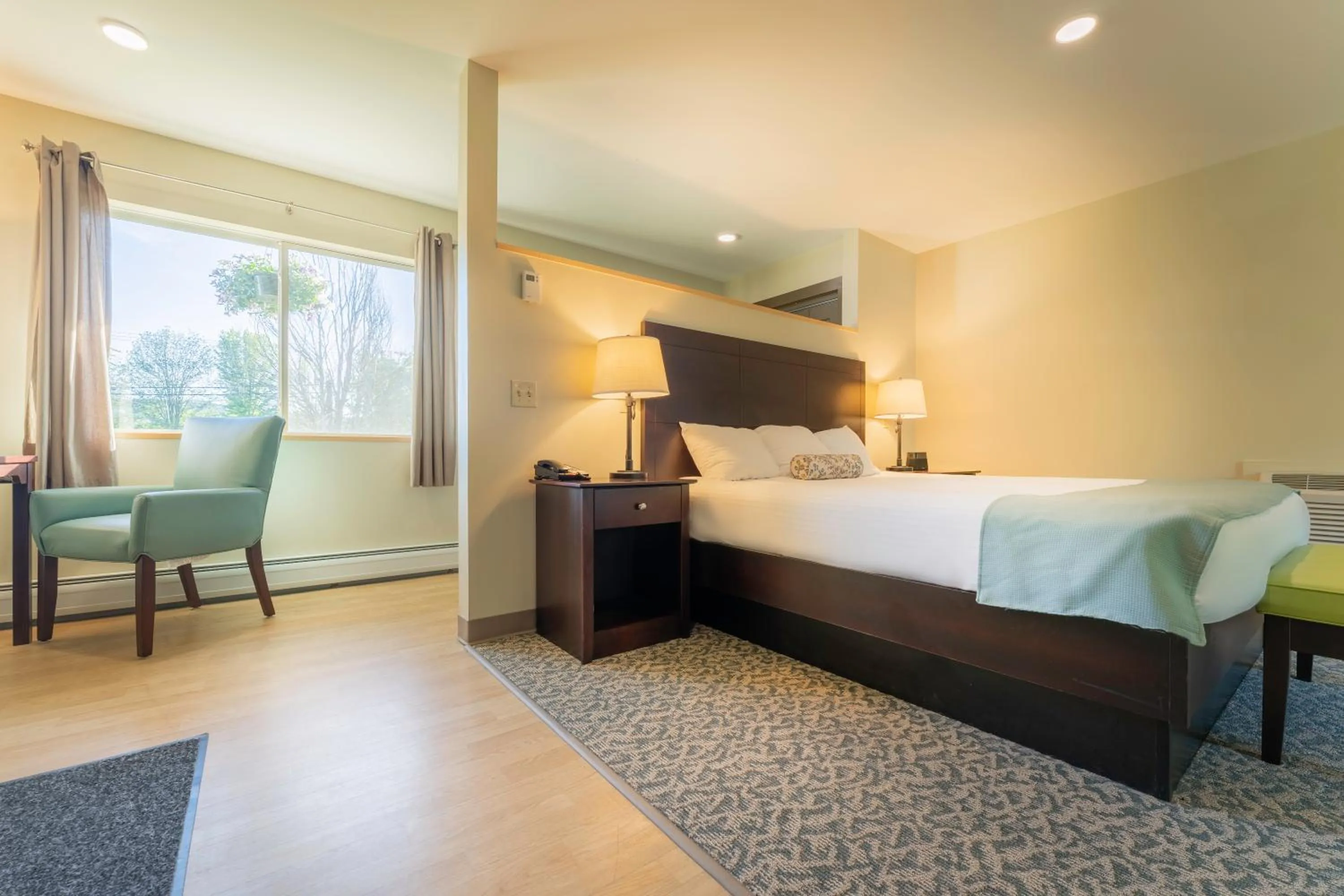 Bed in Sun & Ski Inn and Suites