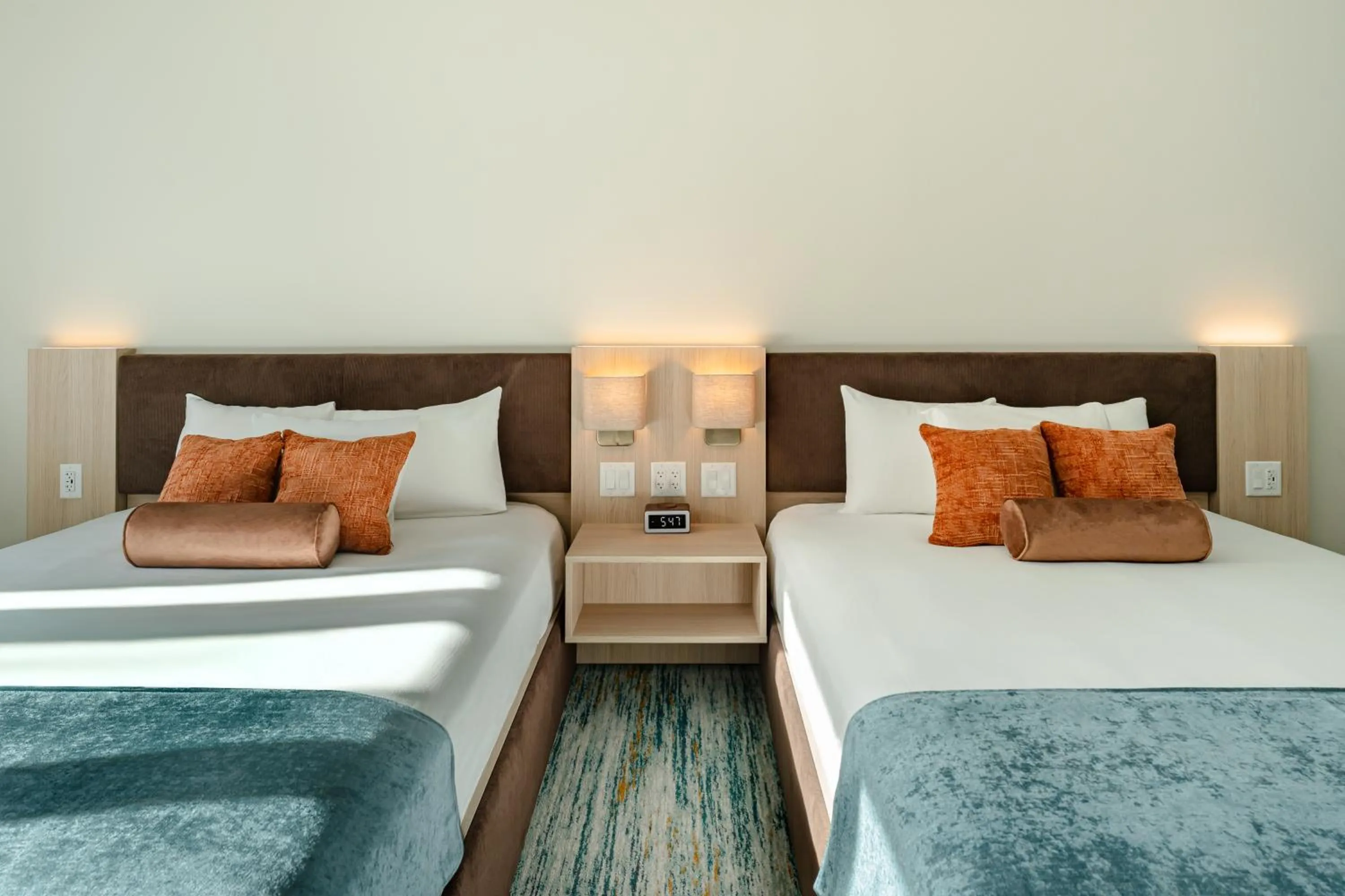 Bed in Sun & Ski Inn and Suites