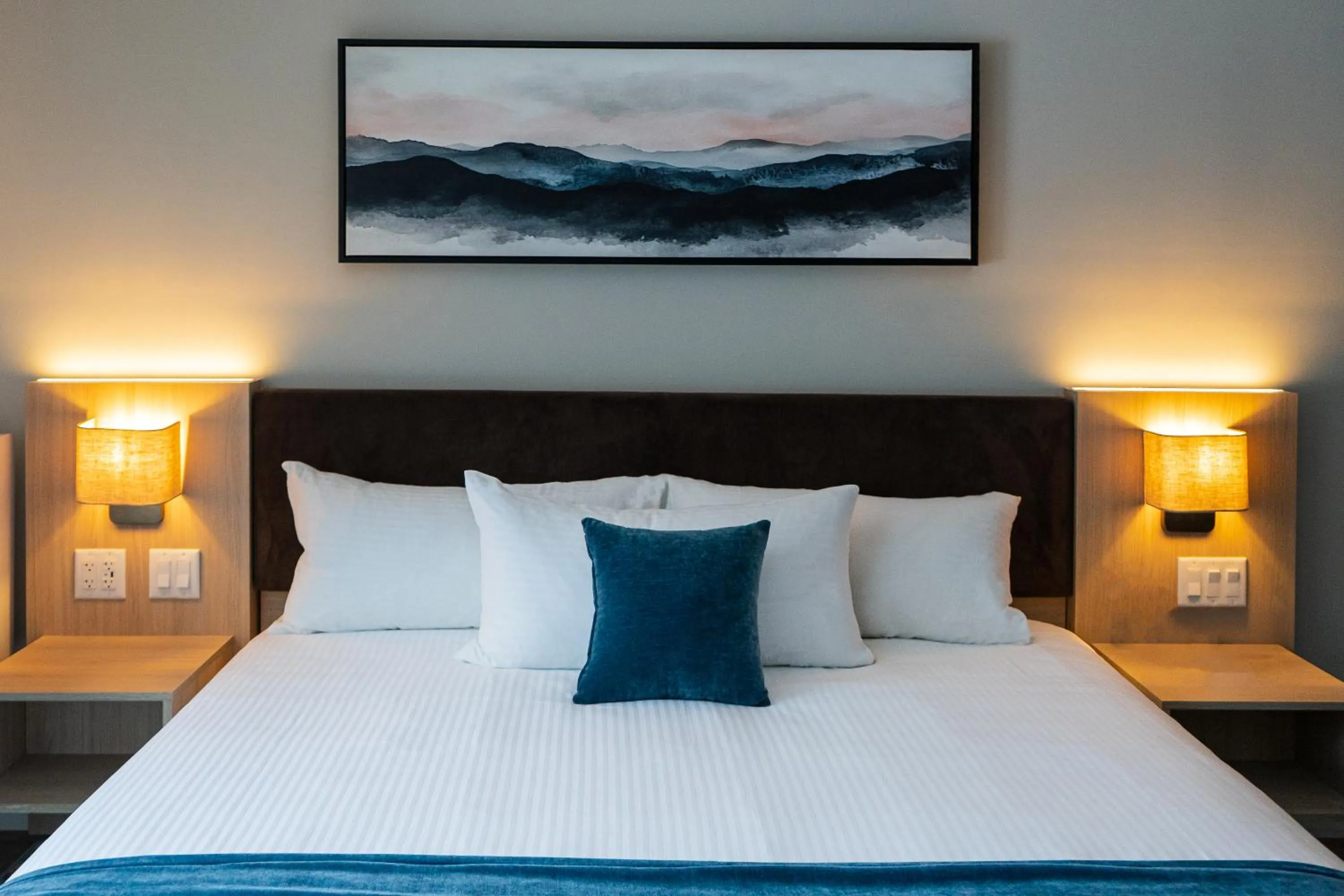 Bed in Sun & Ski Inn and Suites