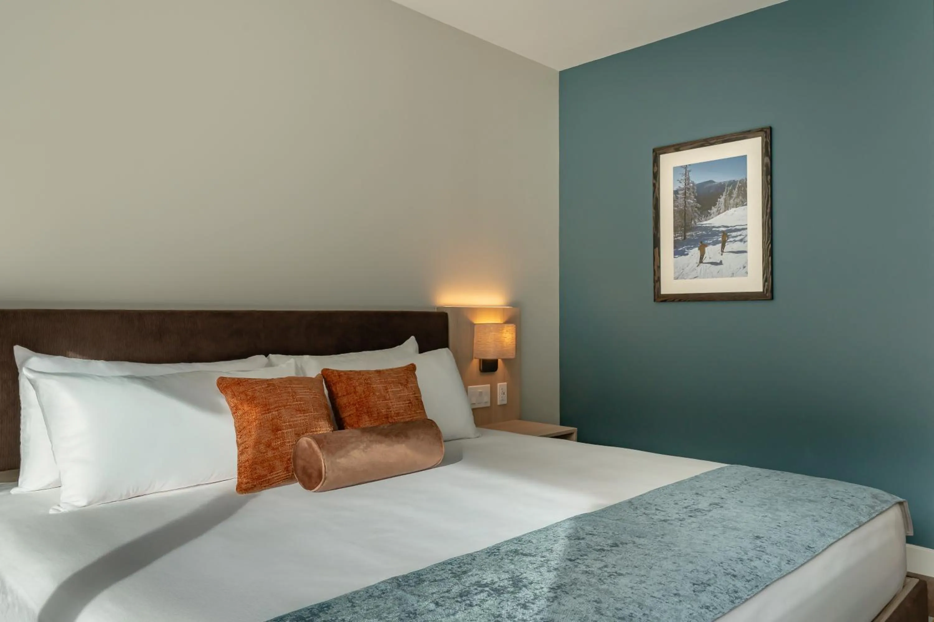 Bed in Sun & Ski Inn and Suites