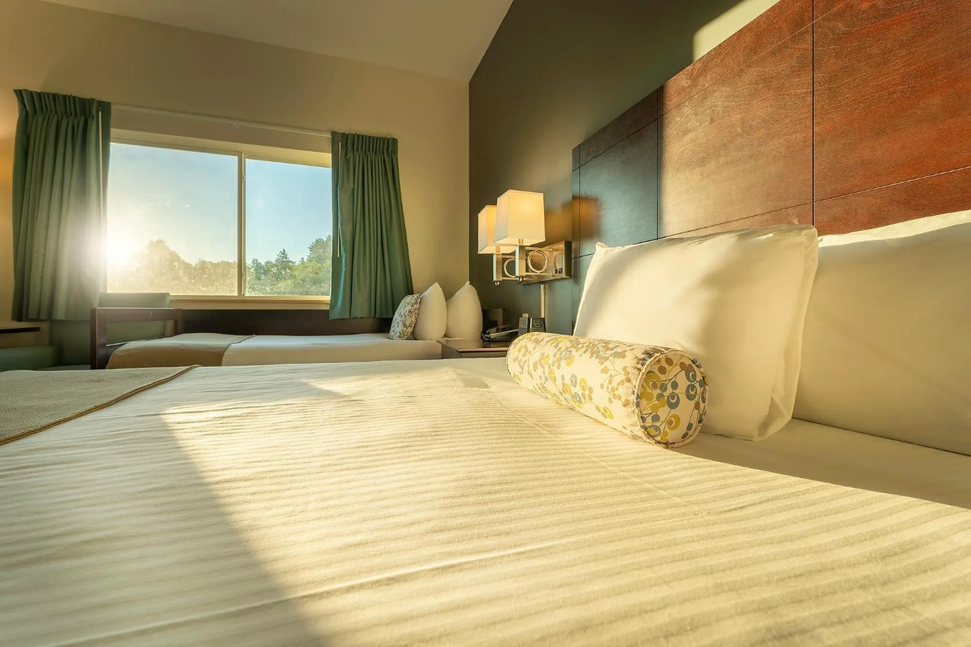 Bed in Sun & Ski Inn and Suites