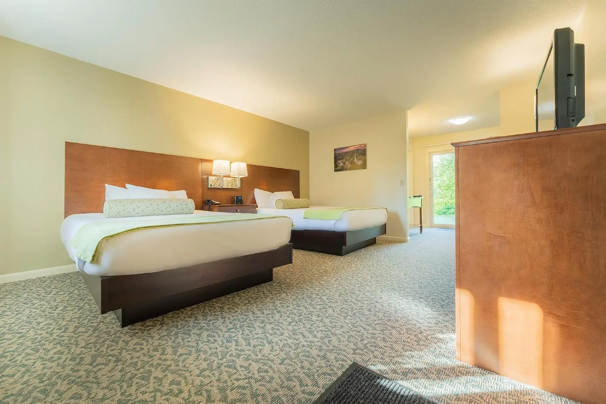 Bedroom, Bed in Sun & Ski Inn and Suites Bedroom, Bed in Sun & Ski Inn and Suites