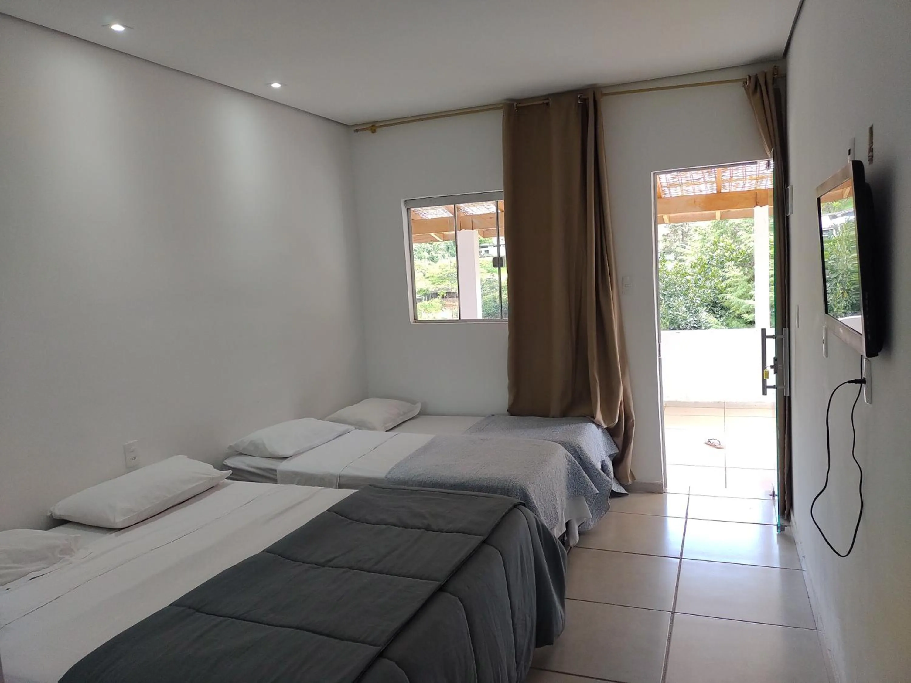 Bed in Pousada Viva Vida