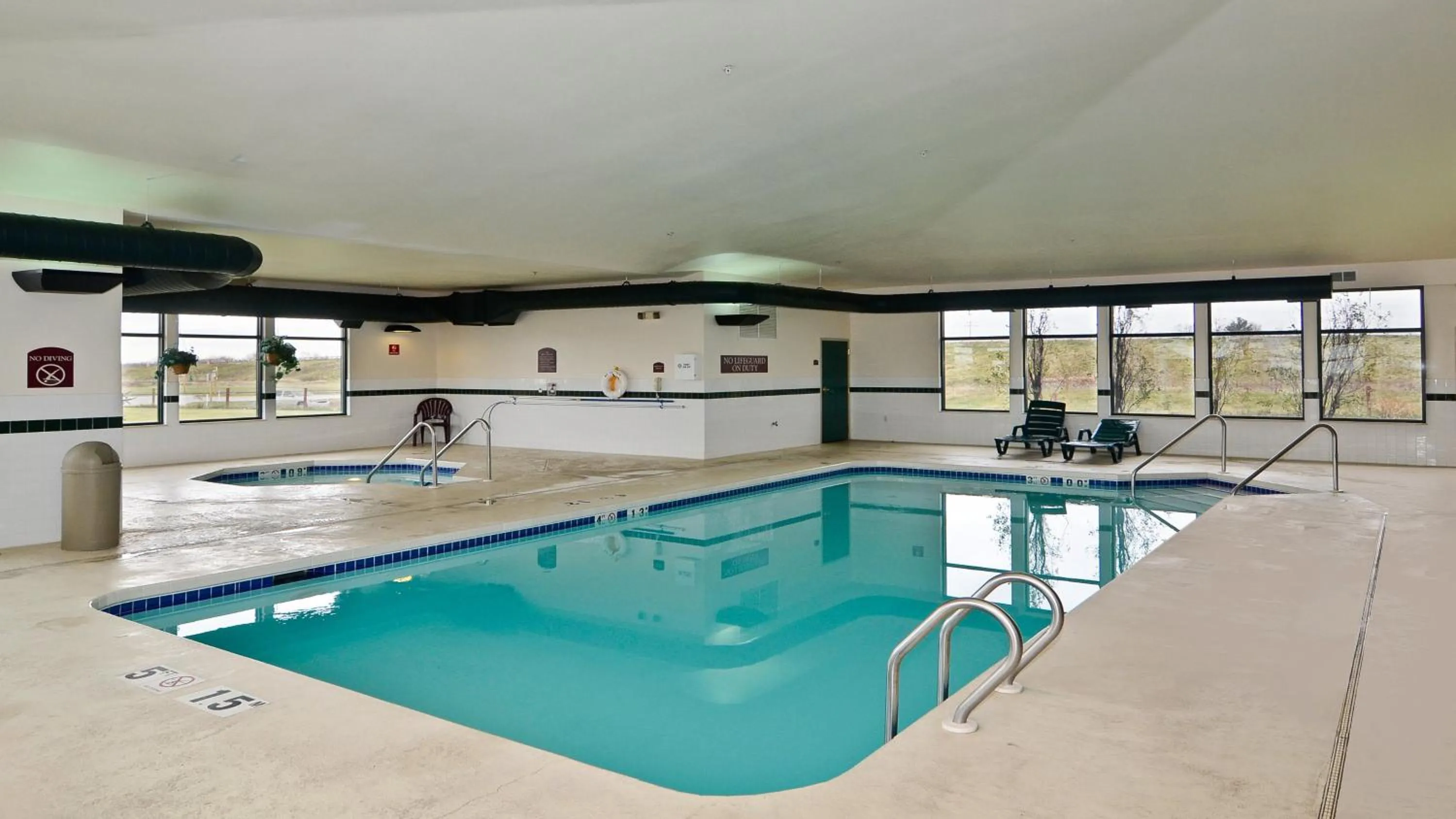 Swimming pool in Holiday Inn Express Hotel & Suites Fort Atkinson by IHG