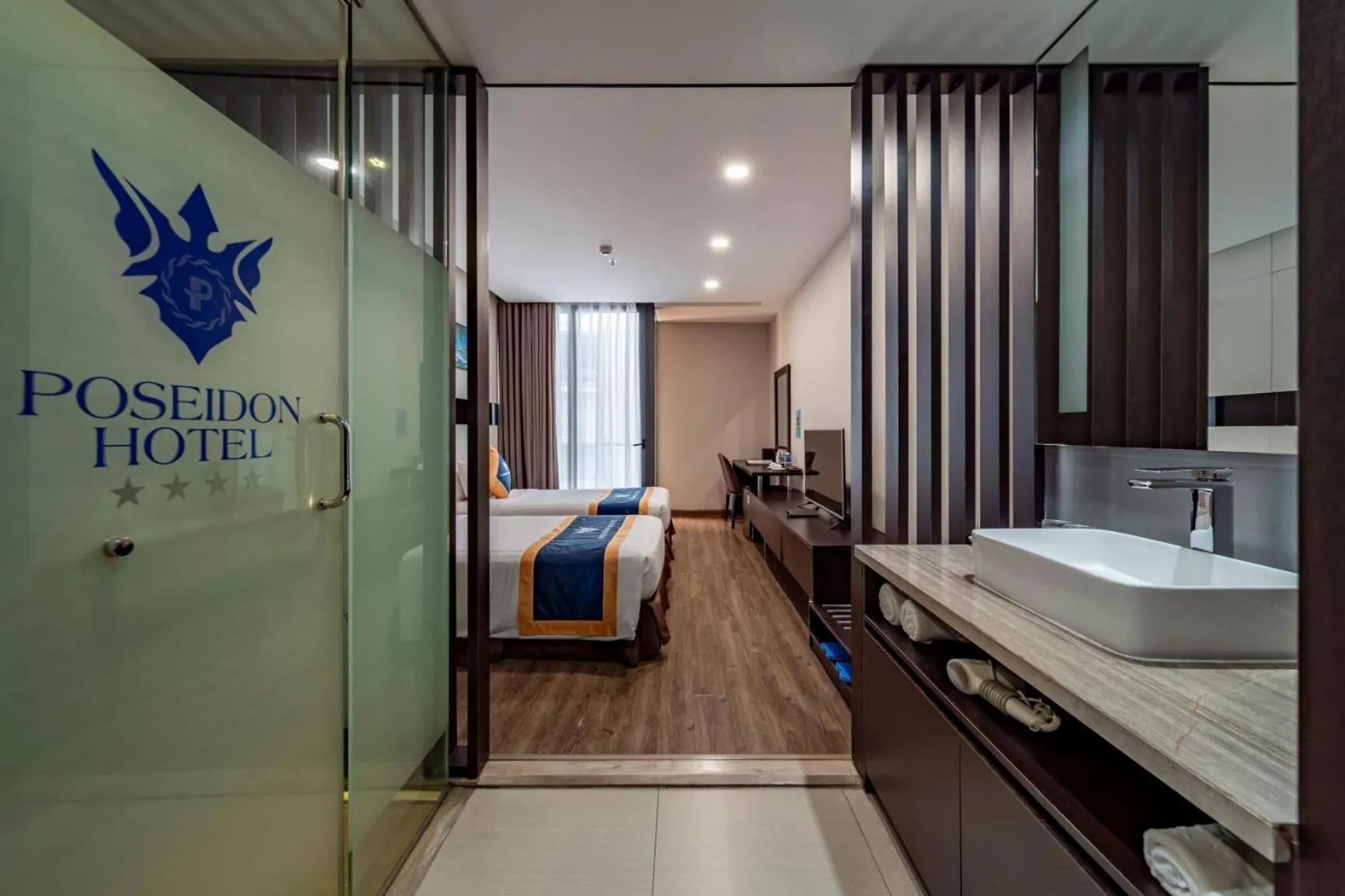 Bed in Poseidon Nha Trang Hotel