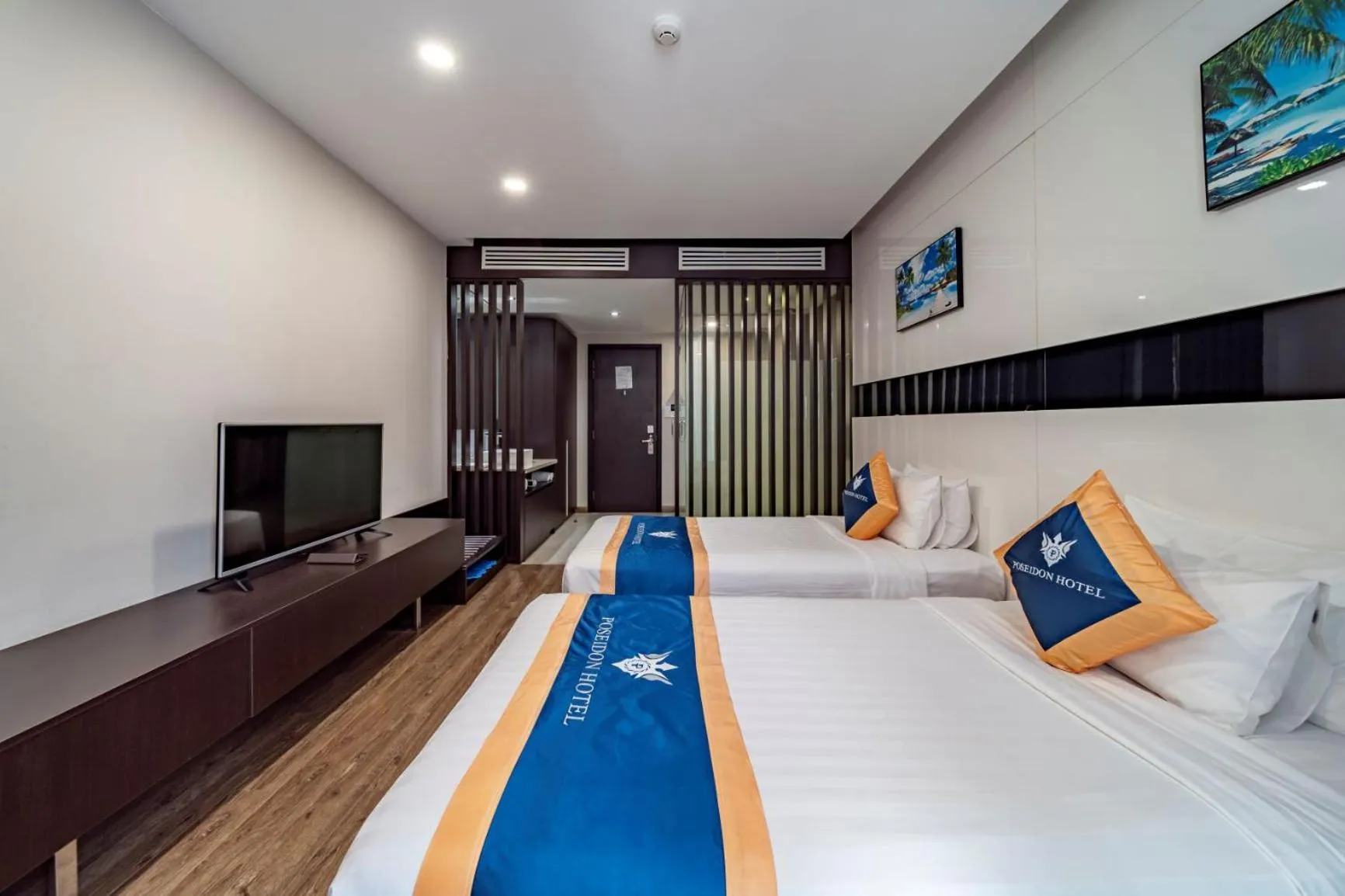 Bed in Poseidon Nha Trang Hotel