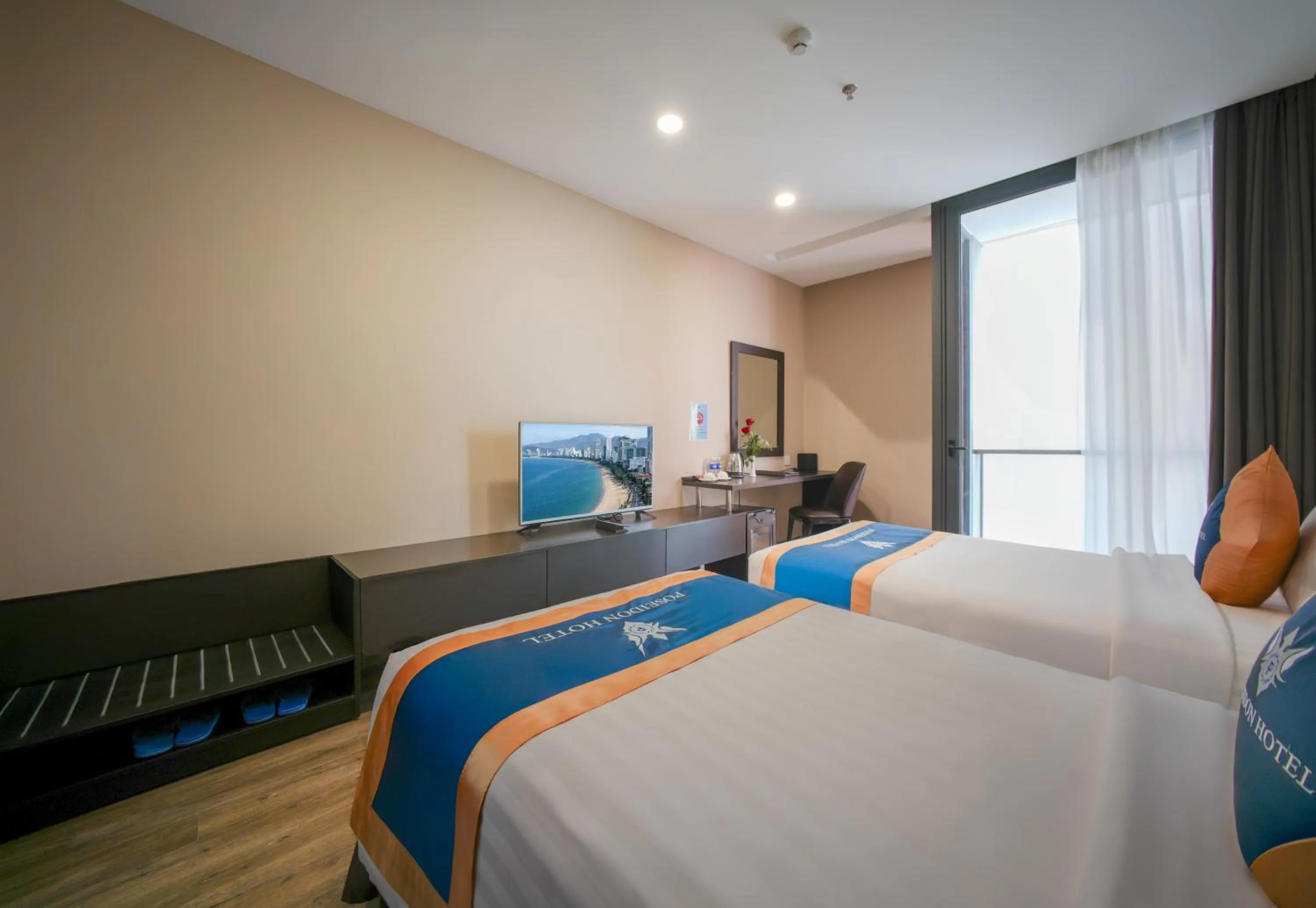 Bed in Poseidon Nha Trang Hotel