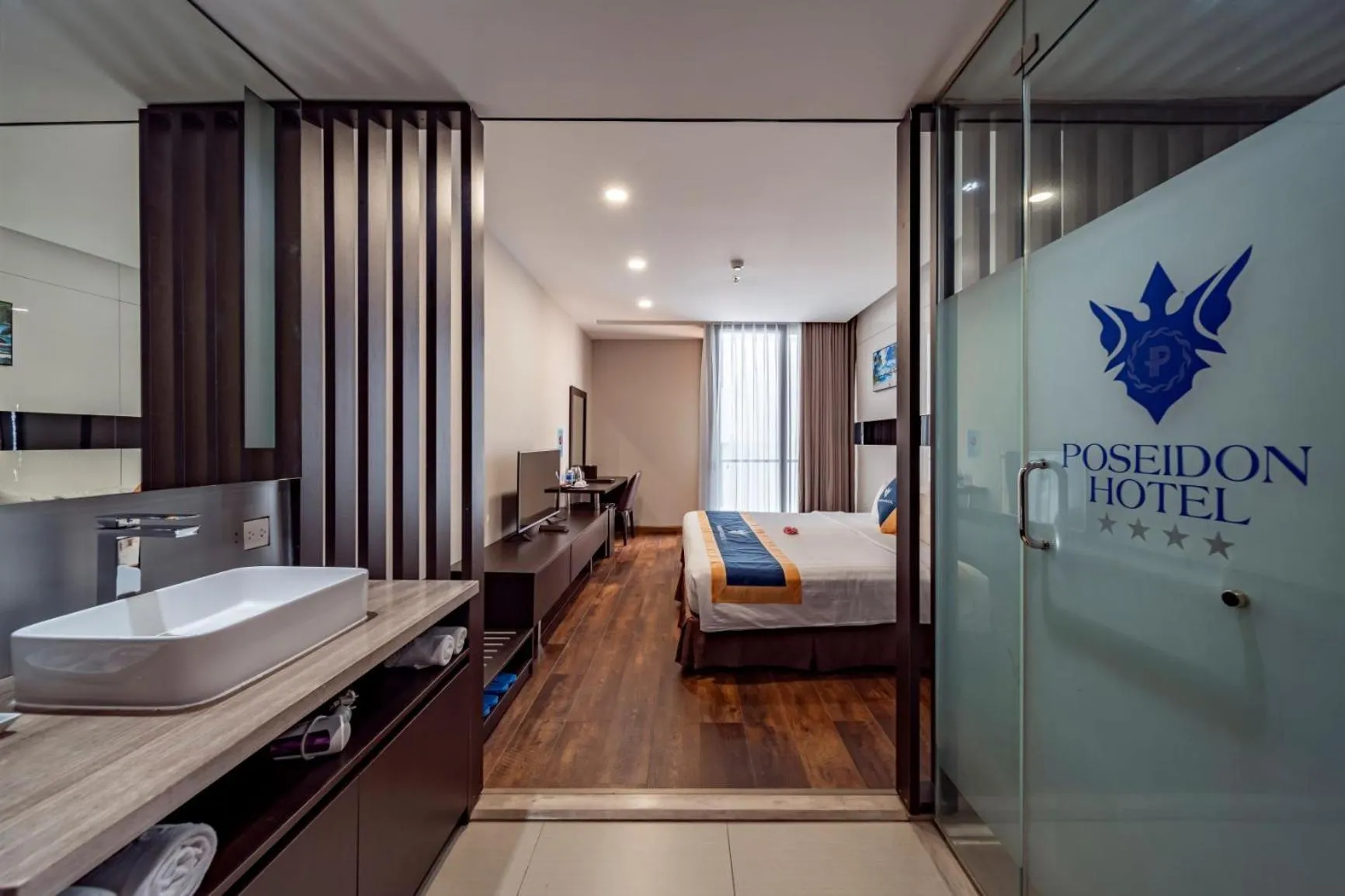 Photo of the whole room, Bed in Poseidon Nha Trang Hotel