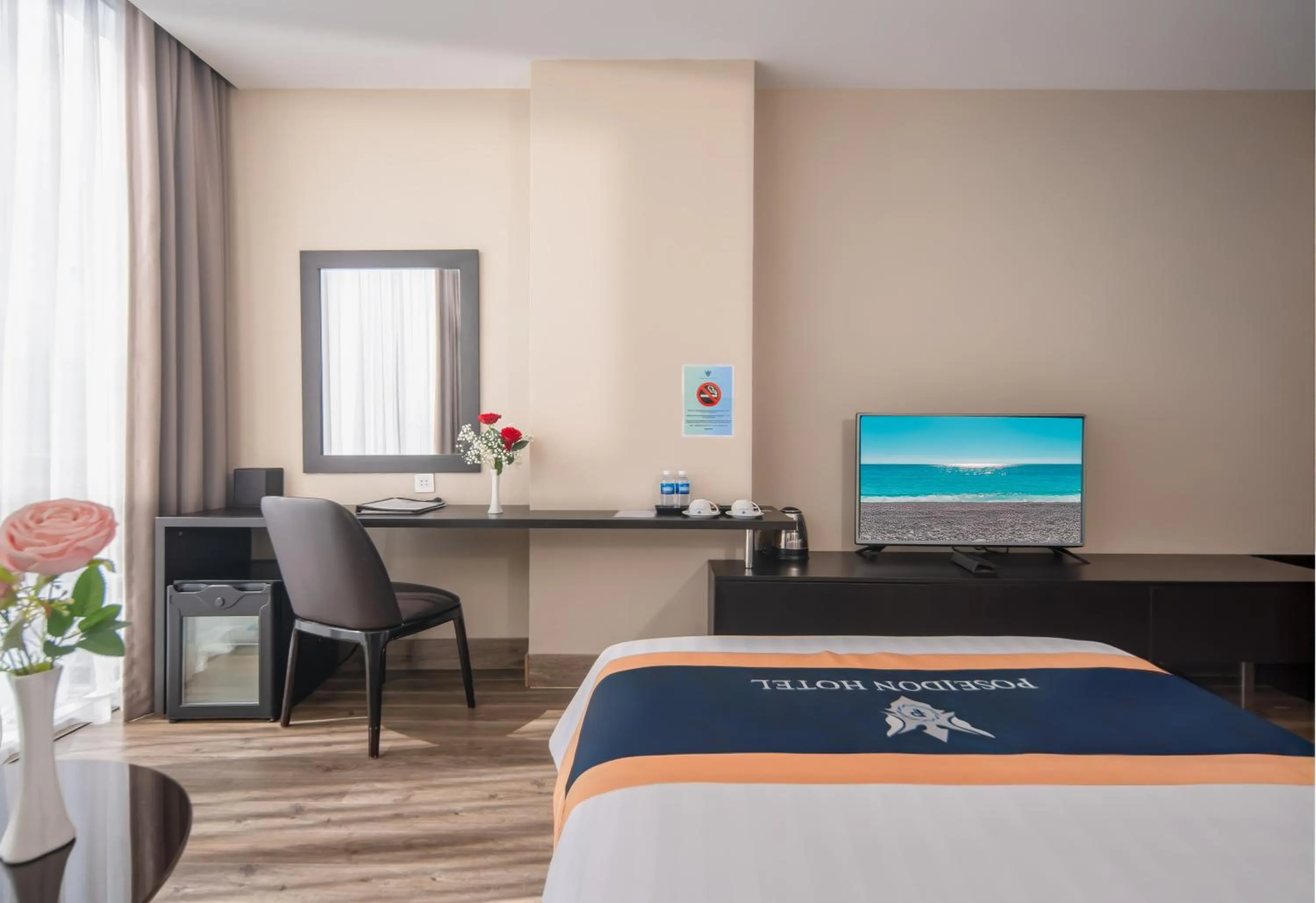 Bed in Poseidon Nha Trang Hotel