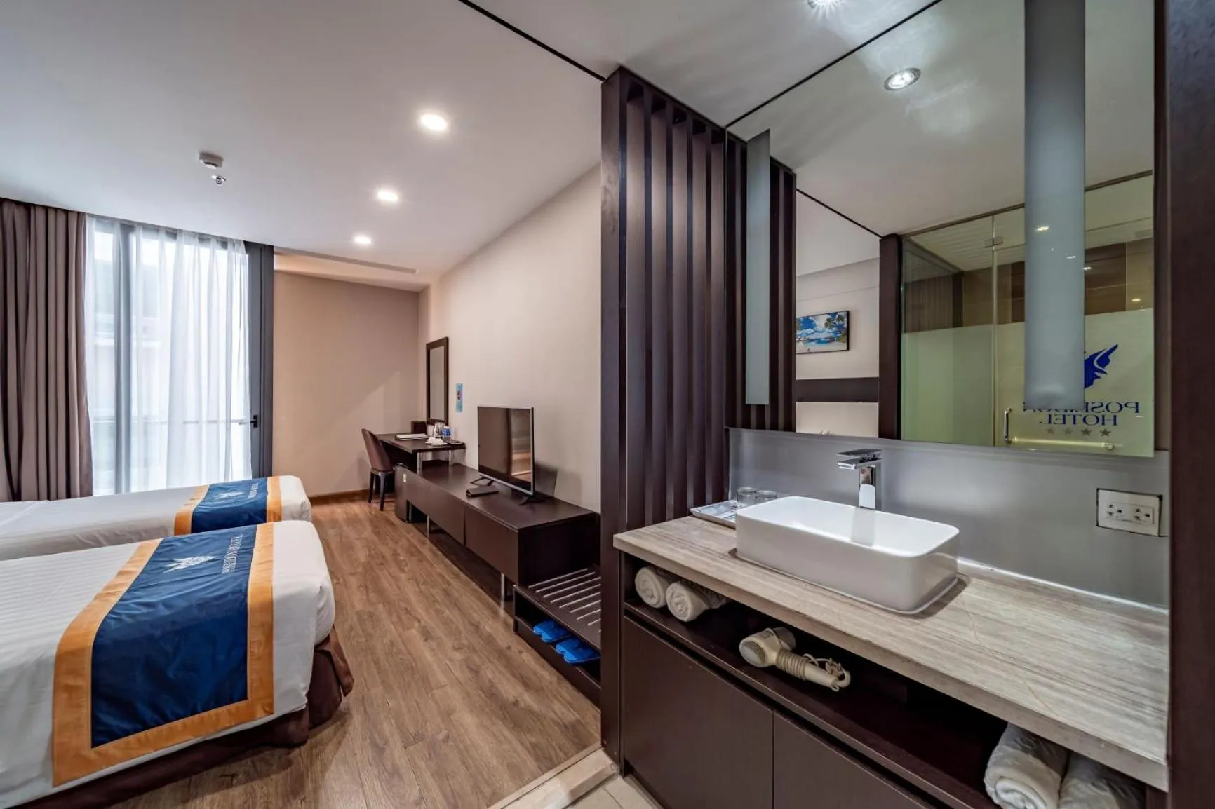 Bed in Poseidon Nha Trang Hotel