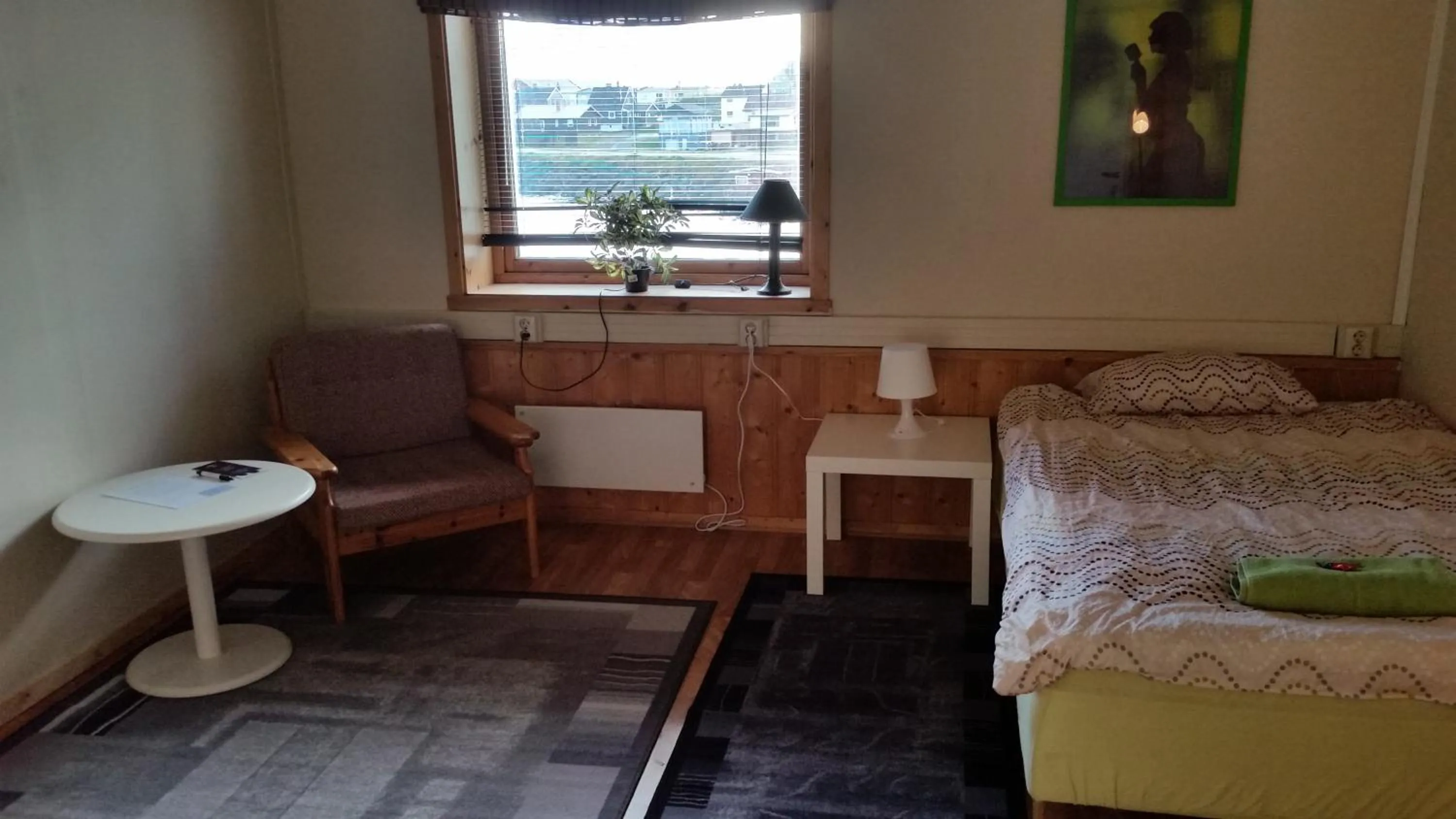 Photo of the whole room, Bed in Wilhelmsen Romutleie