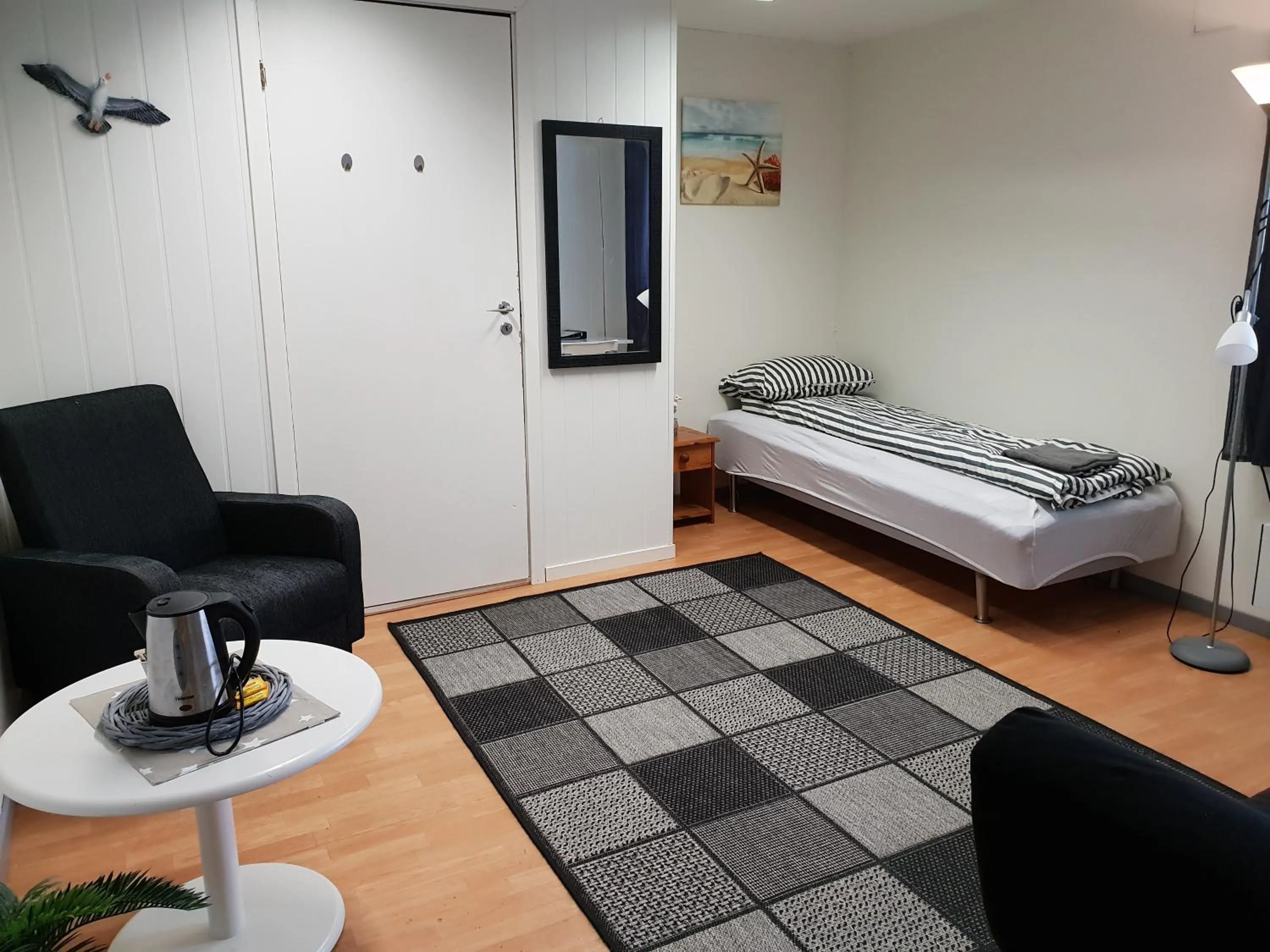 Photo of the whole room, Bed in Wilhelmsen Romutleie