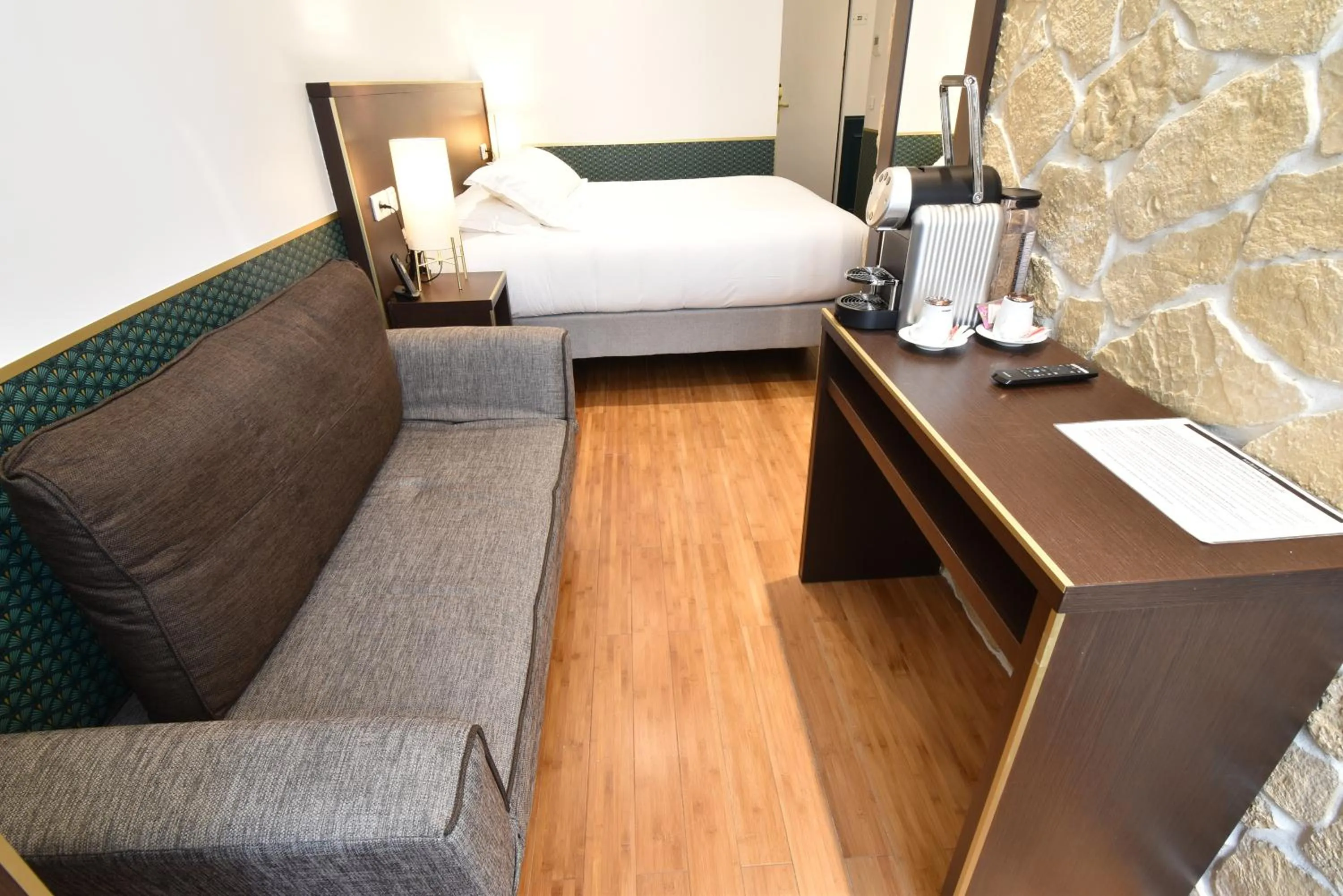 Photo of the whole room, Bed in Hôtel Bonne Nouvelle