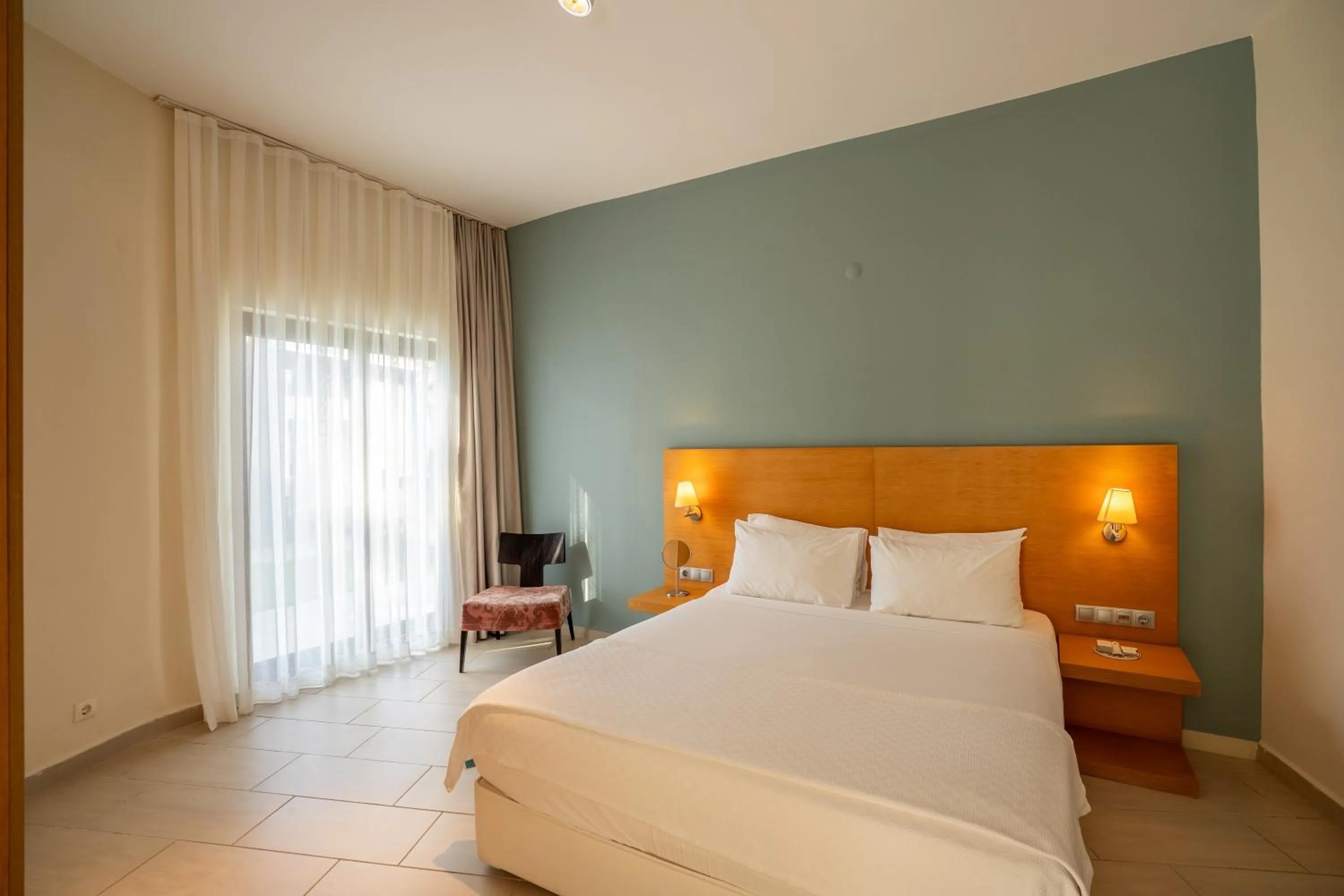 Bed in Med-Inn Hotel