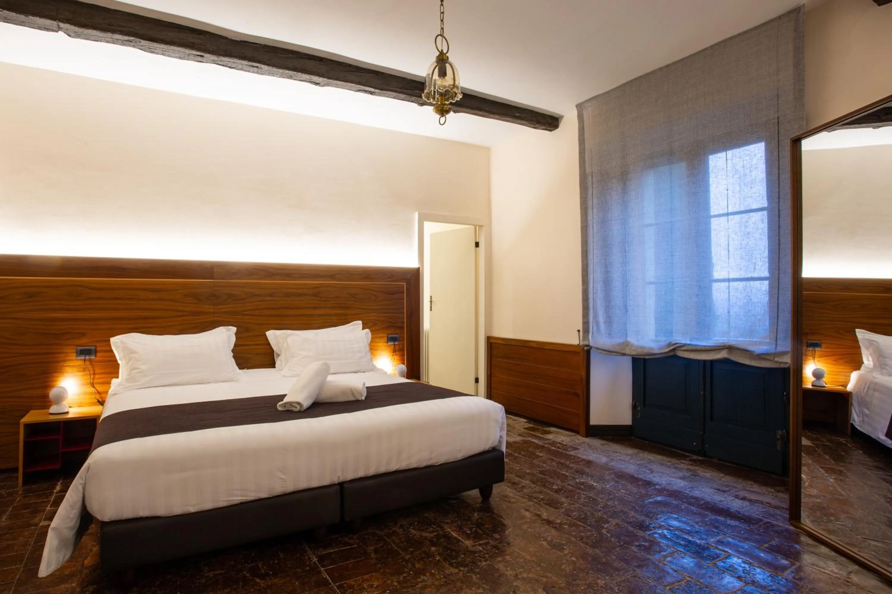 Photo of the whole room, Bed in La Loggia Historic Resort