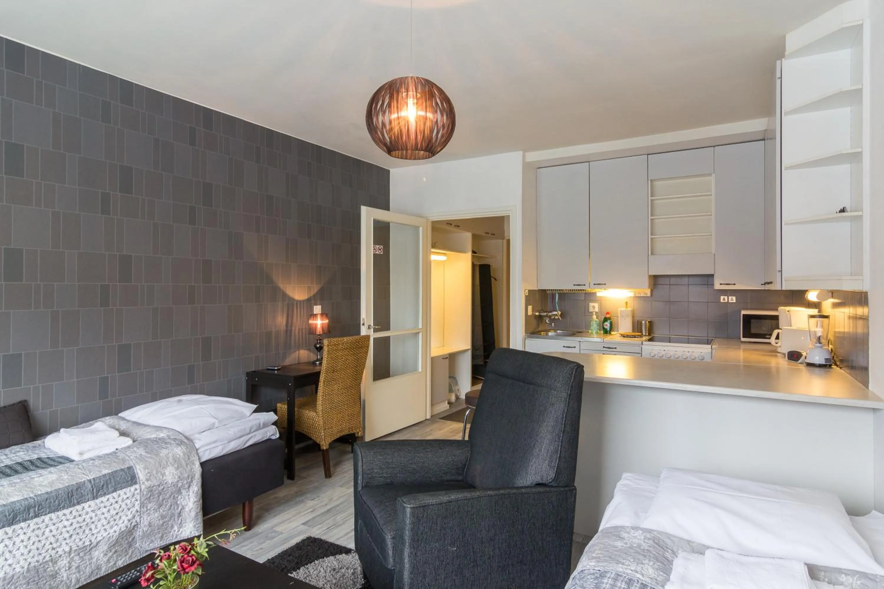 Kitchen or kitchenette, Bed in Santa's City Apartments