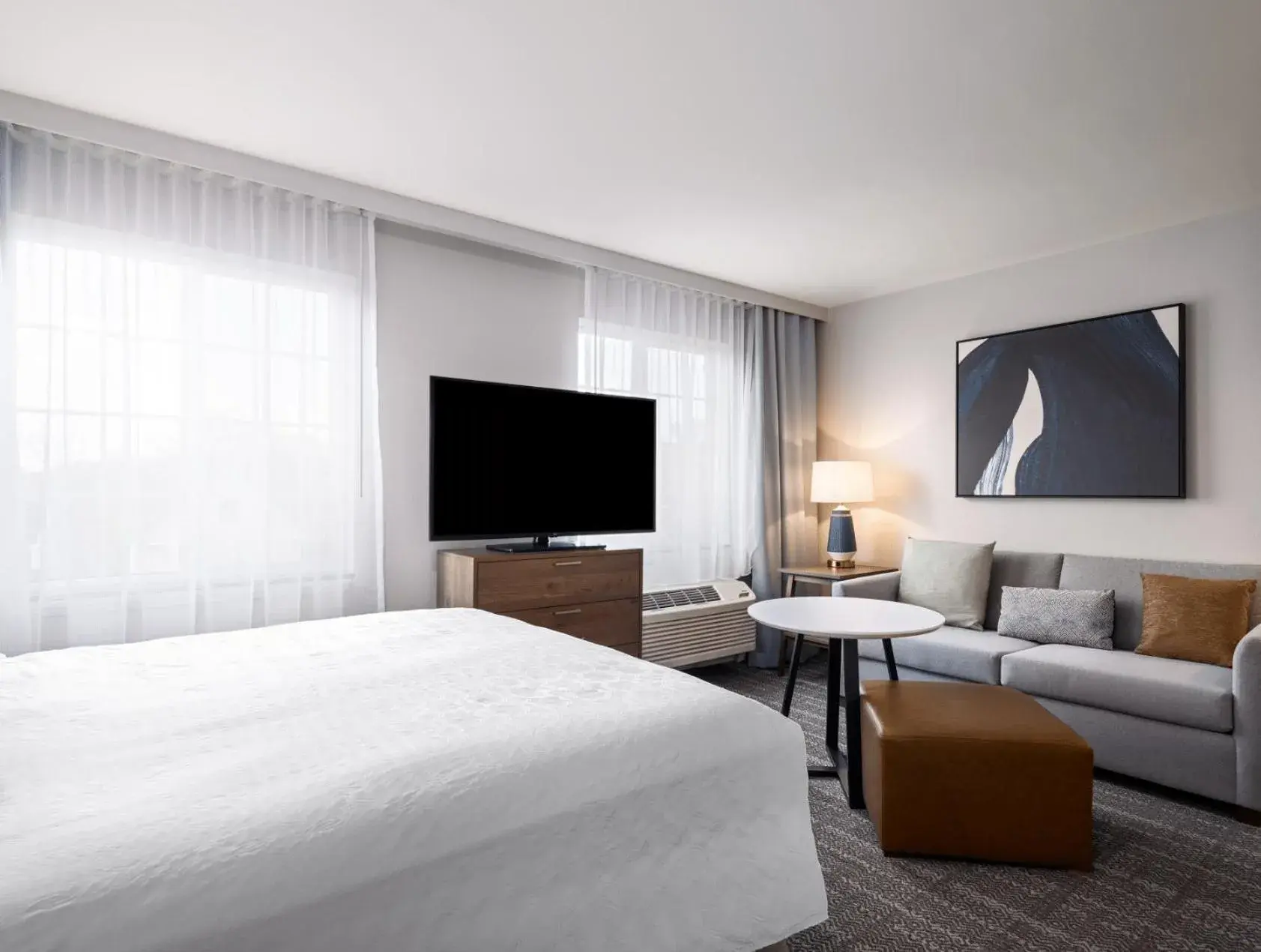 Living room, Bed in Staybridge Suites Rochester University by IHG Living room, Bed in Staybridge Suites Rochester University by IHG